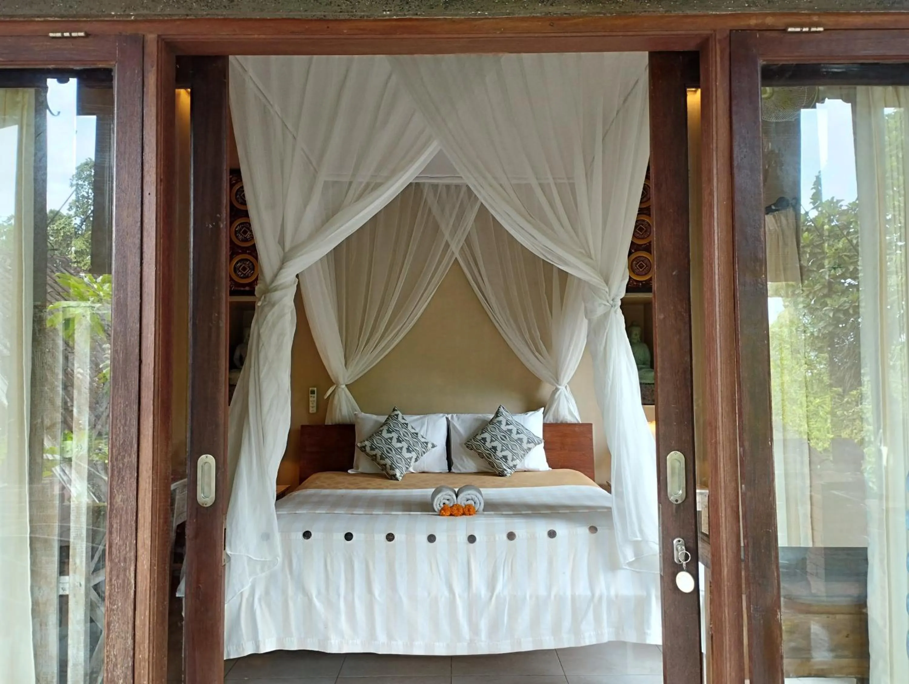 Bed in Umah Ubud Guest House