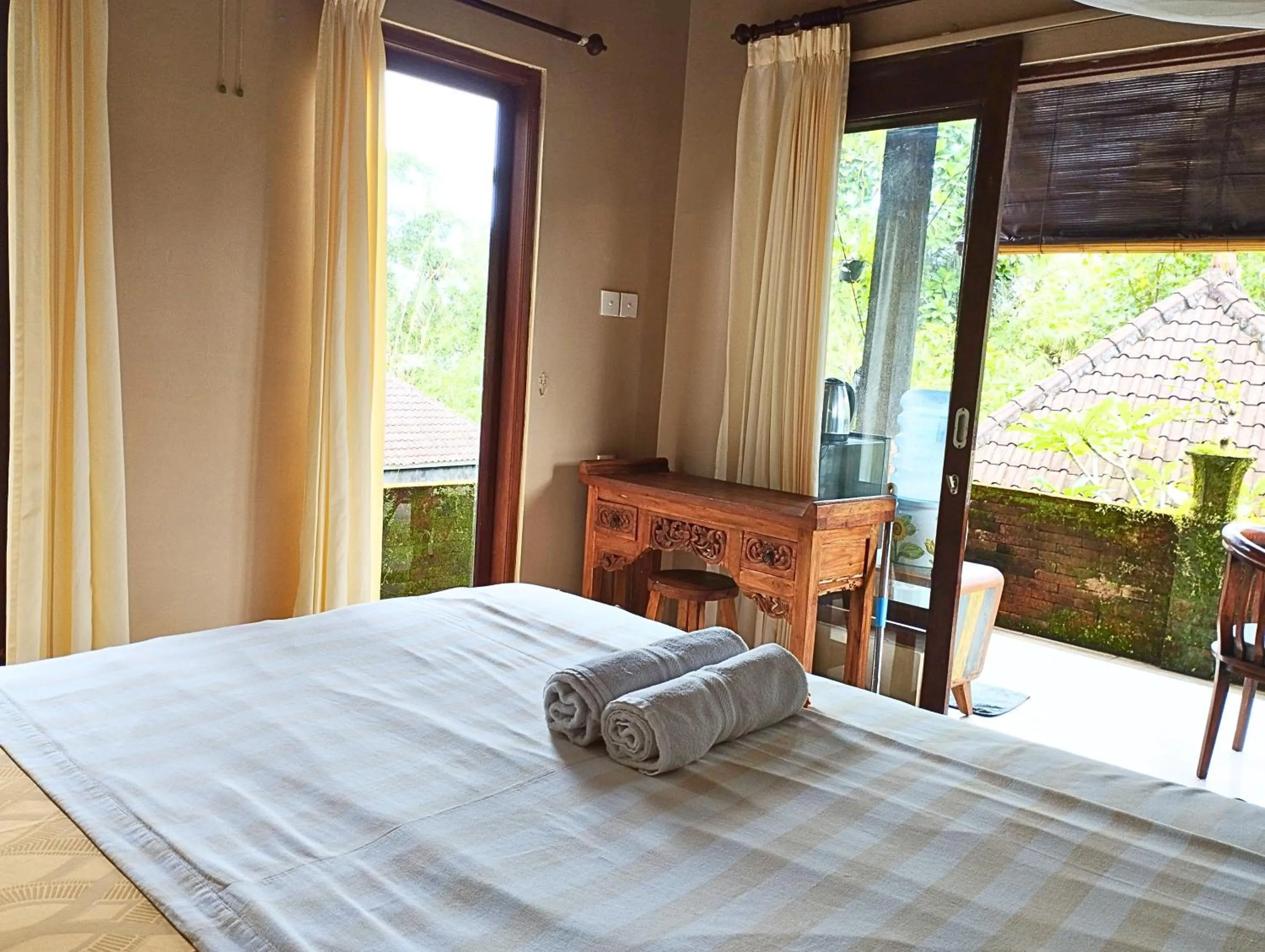 Bed in Umah Ubud Guest House