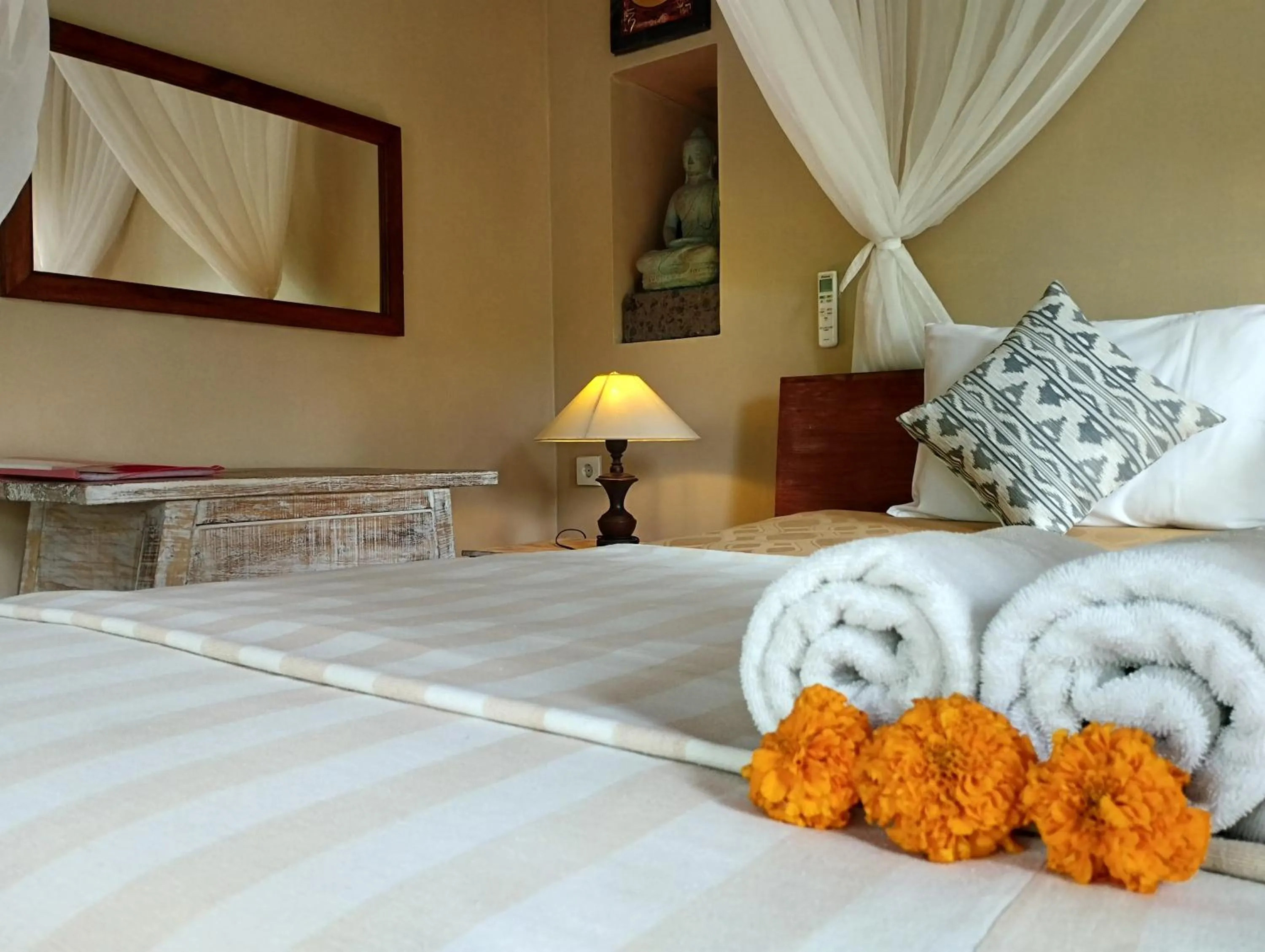 Bed in Umah Ubud Guest House