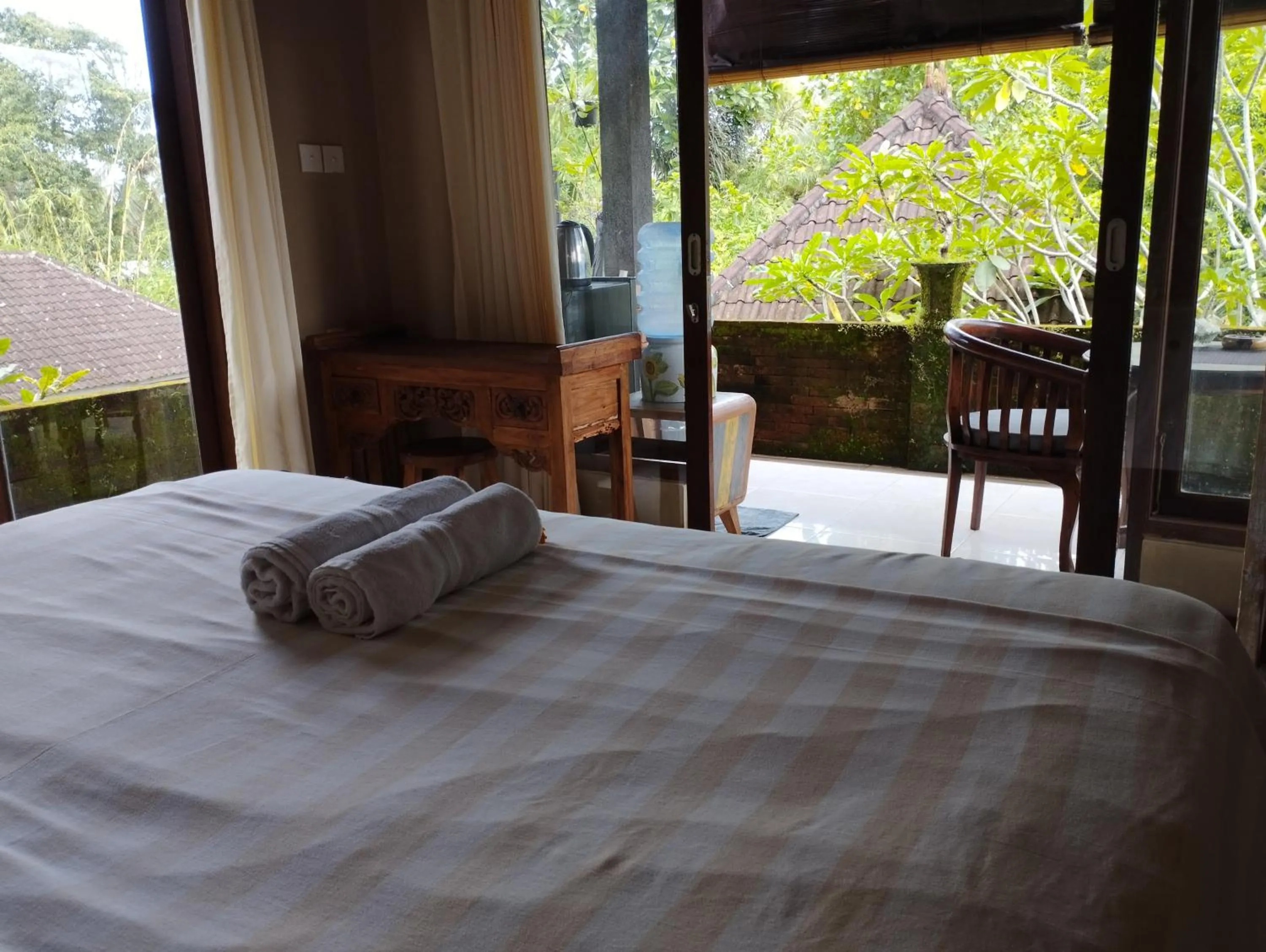 Bed in Umah Ubud Guest House