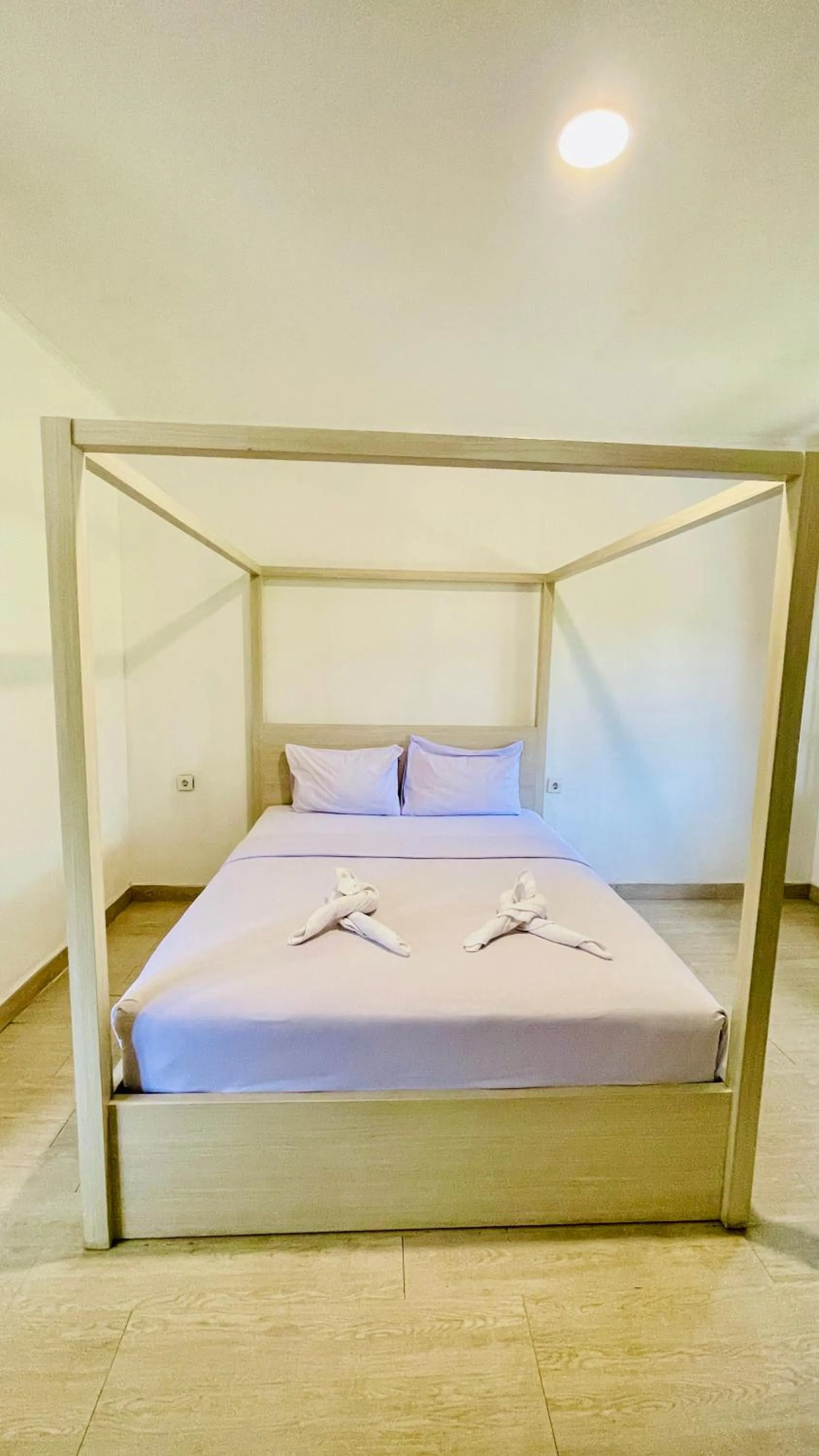 Bed in Aman Gati Hotel Lakey