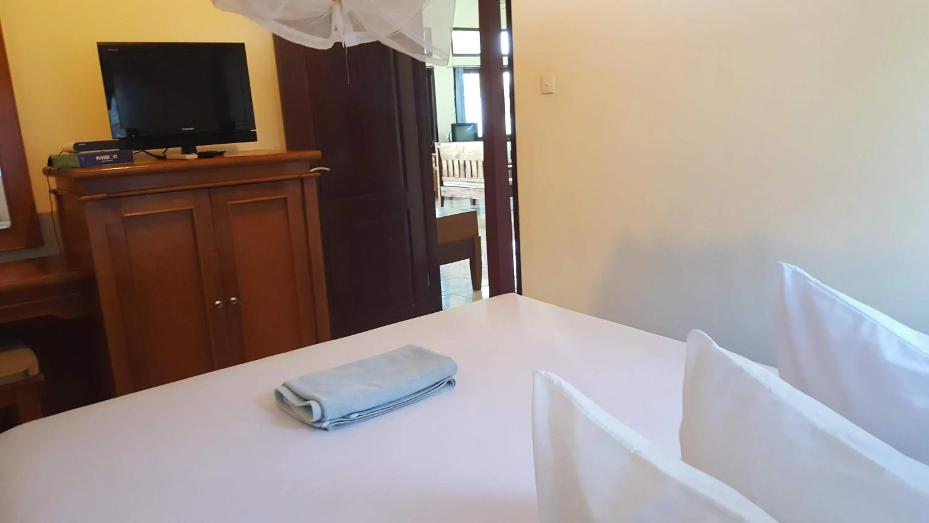 Bed in Aman Gati Hotel Lakey