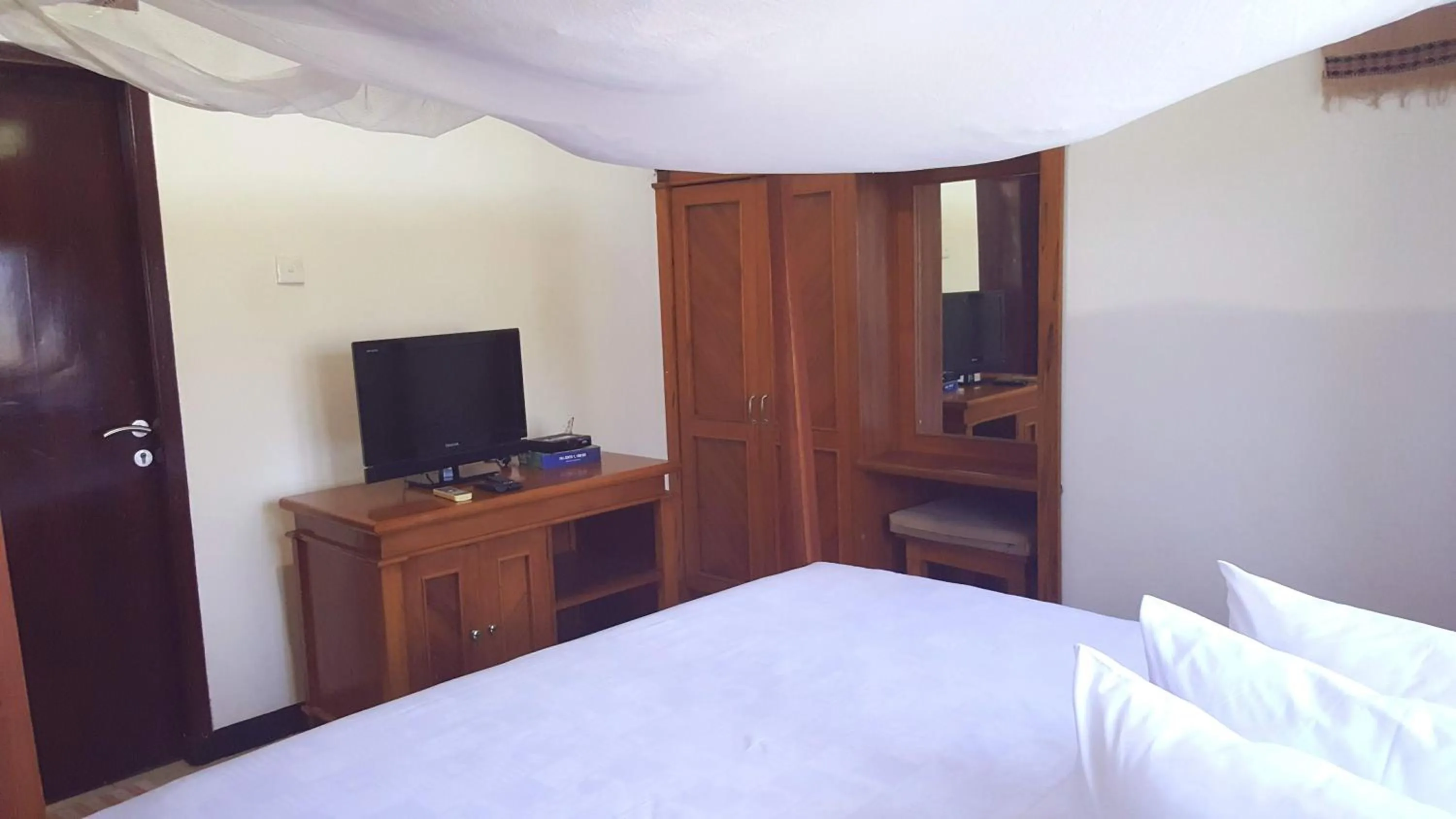 Bed in Aman Gati Hotel Lakey