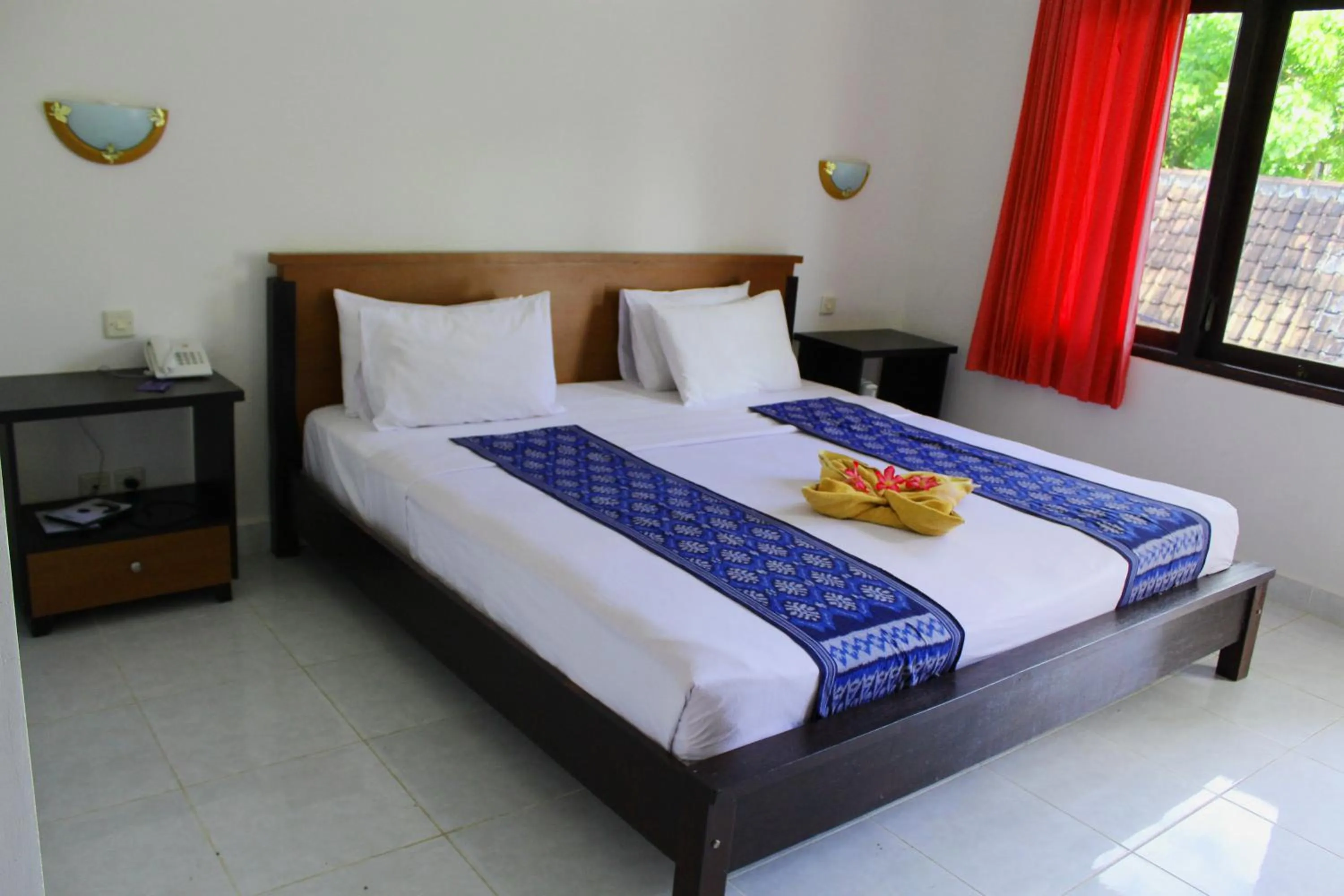 Bed in Aman Gati Hotel Lakey