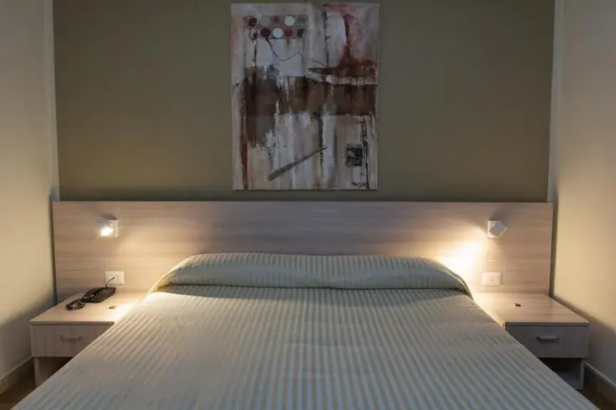 Bed in Hotel Scacciapensieri Bed in Hotel Scacciapensieri