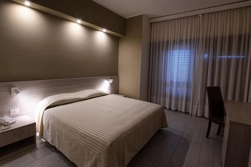 Bed in Hotel Scacciapensieri