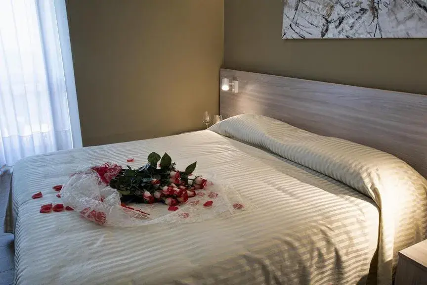 Bed in Hotel Scacciapensieri Bed in Hotel Scacciapensieri