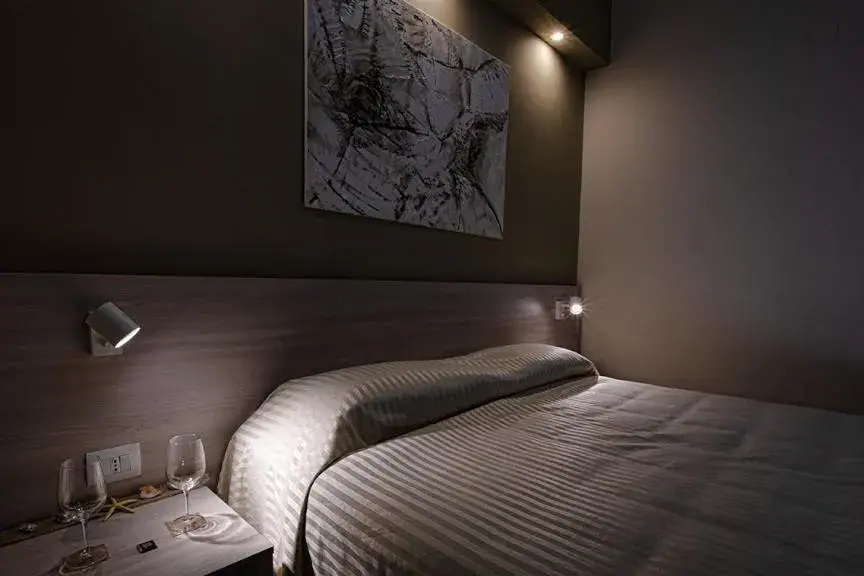 Bed in Hotel Scacciapensieri Bed in Hotel Scacciapensieri