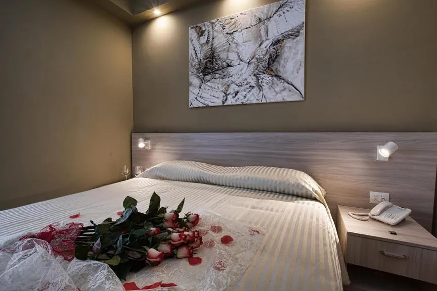 Bed in Hotel Scacciapensieri