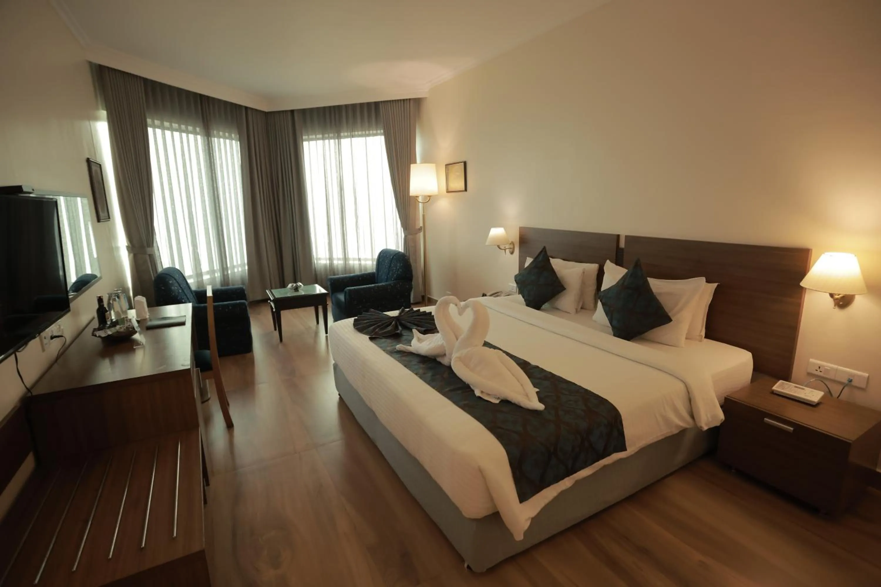 Bed in The Quilon Beach Hotel and Convention Center