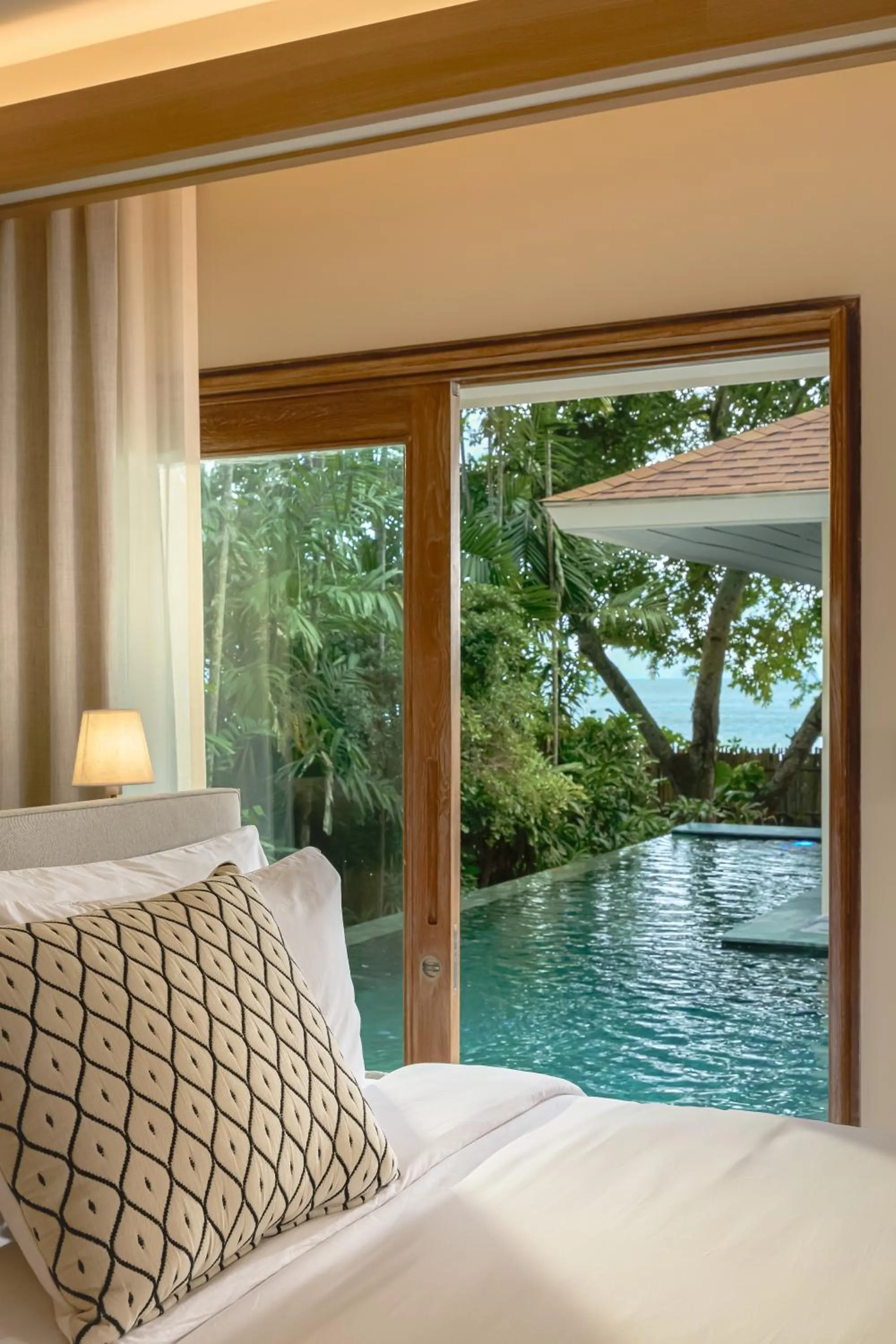 Pool view, Bed in Villa Macaque and Villa Languor