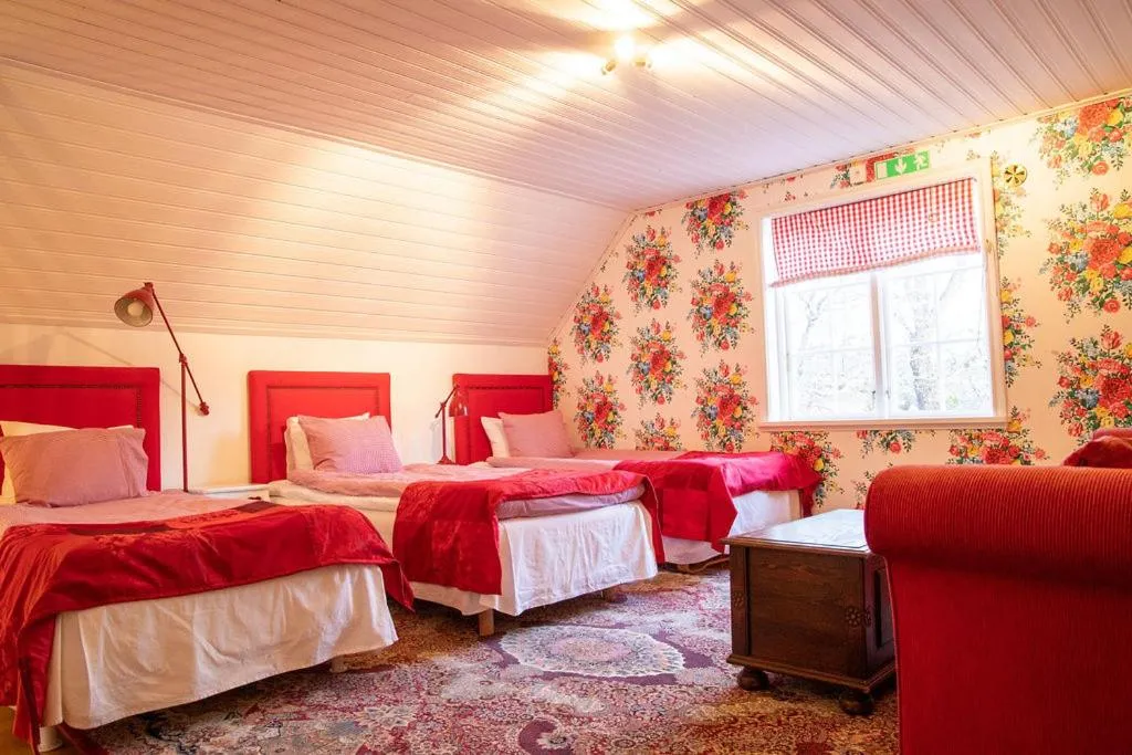Bed in Hem till Gården boutique hotel