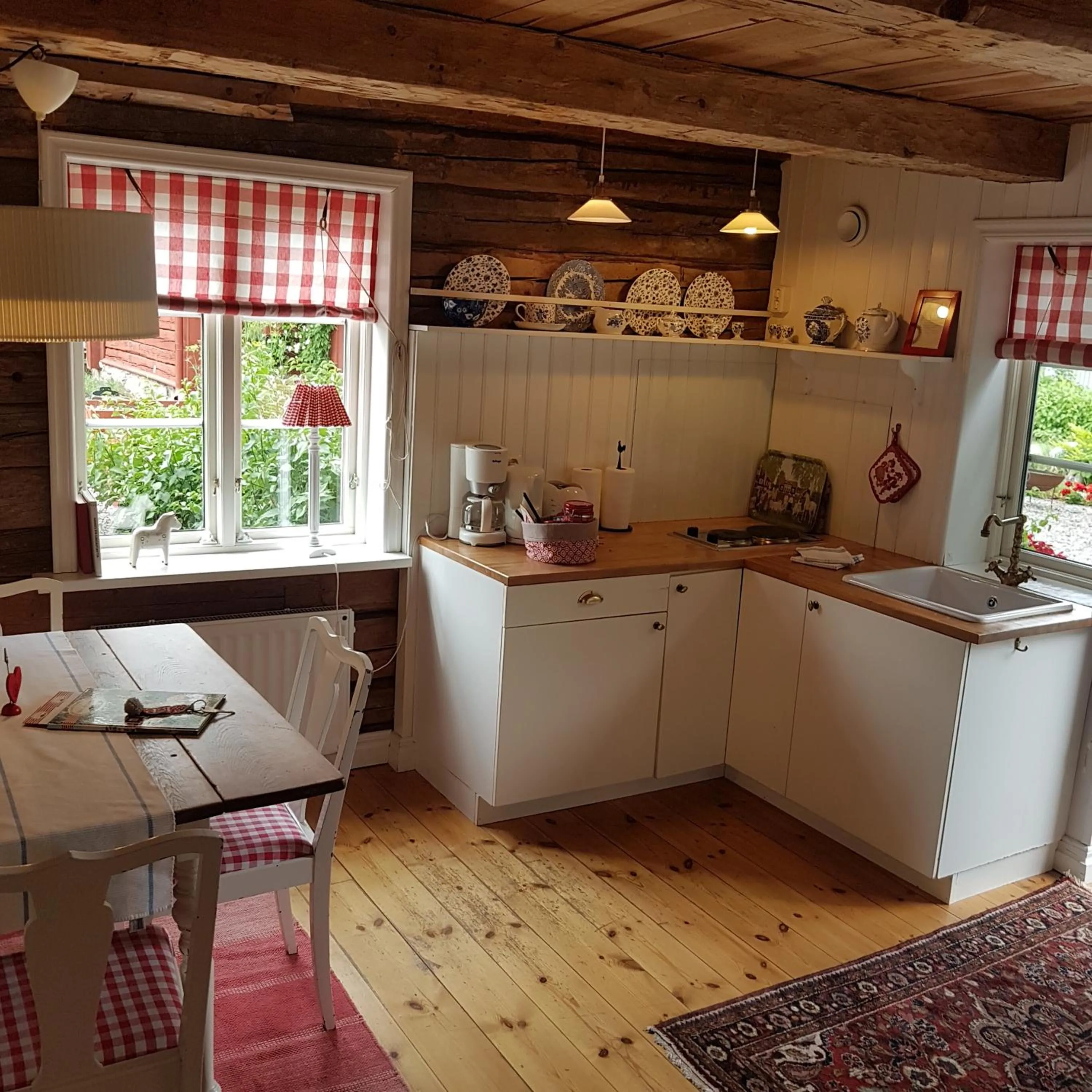 Kitchen or kitchenette in Hem till Gården boutique hotel