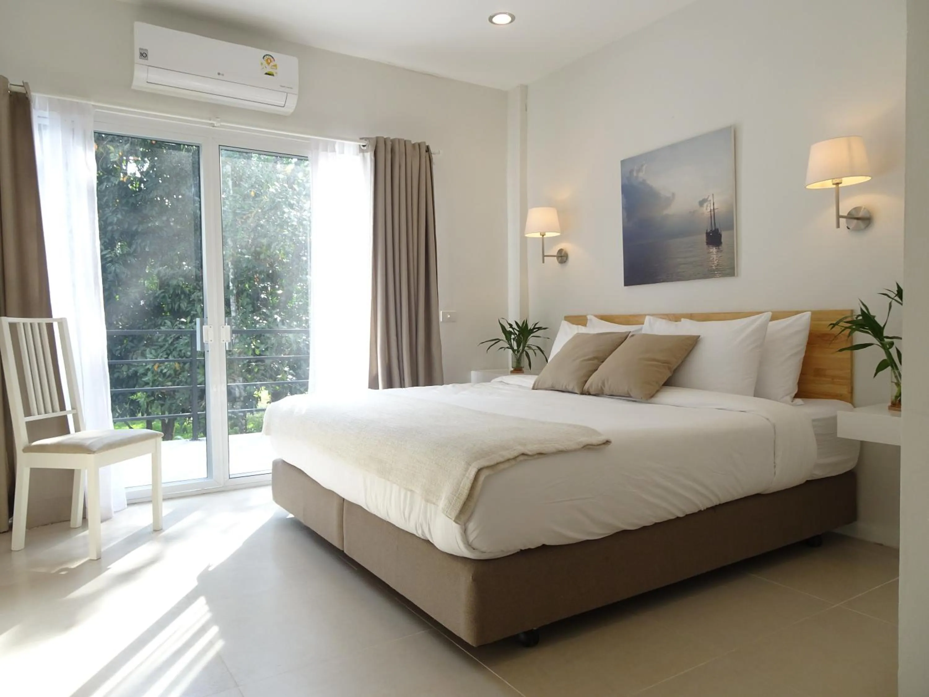 Bed in Isara Khao Lak