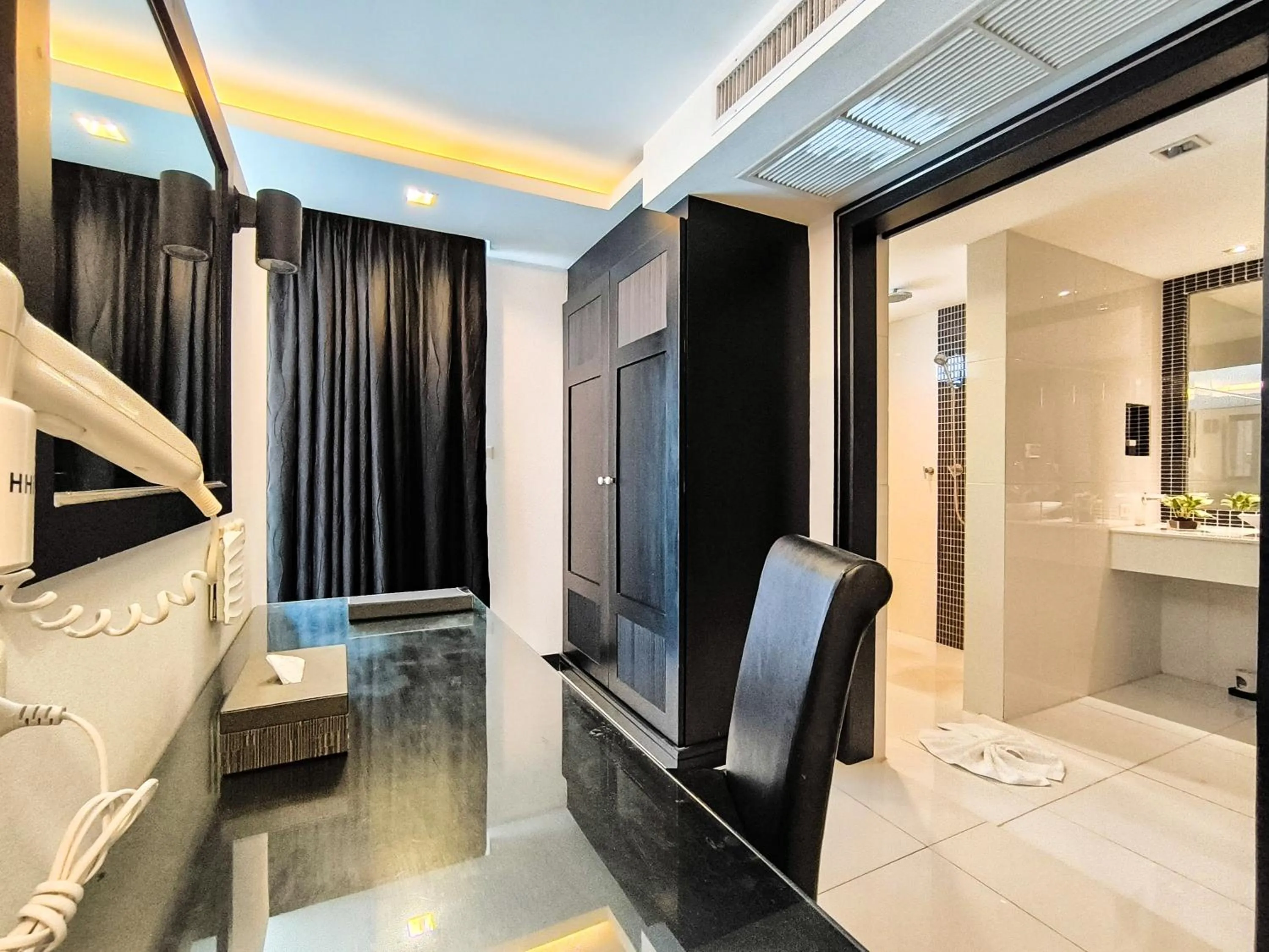 wardrobe in Nova Suites Pattaya by Compass Hospitality