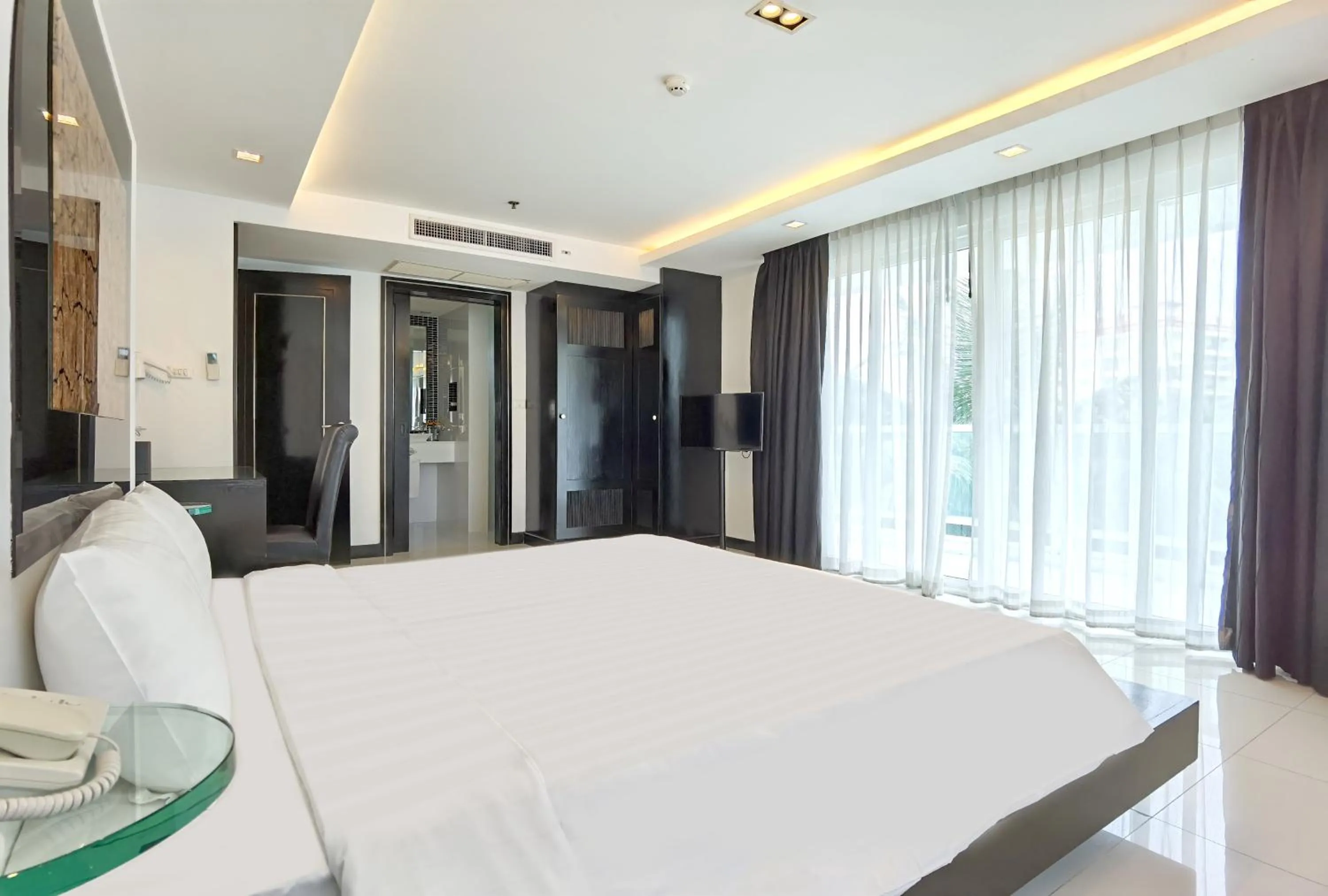 Bedroom, Bed in Nova Suites Pattaya by Compass Hospitality