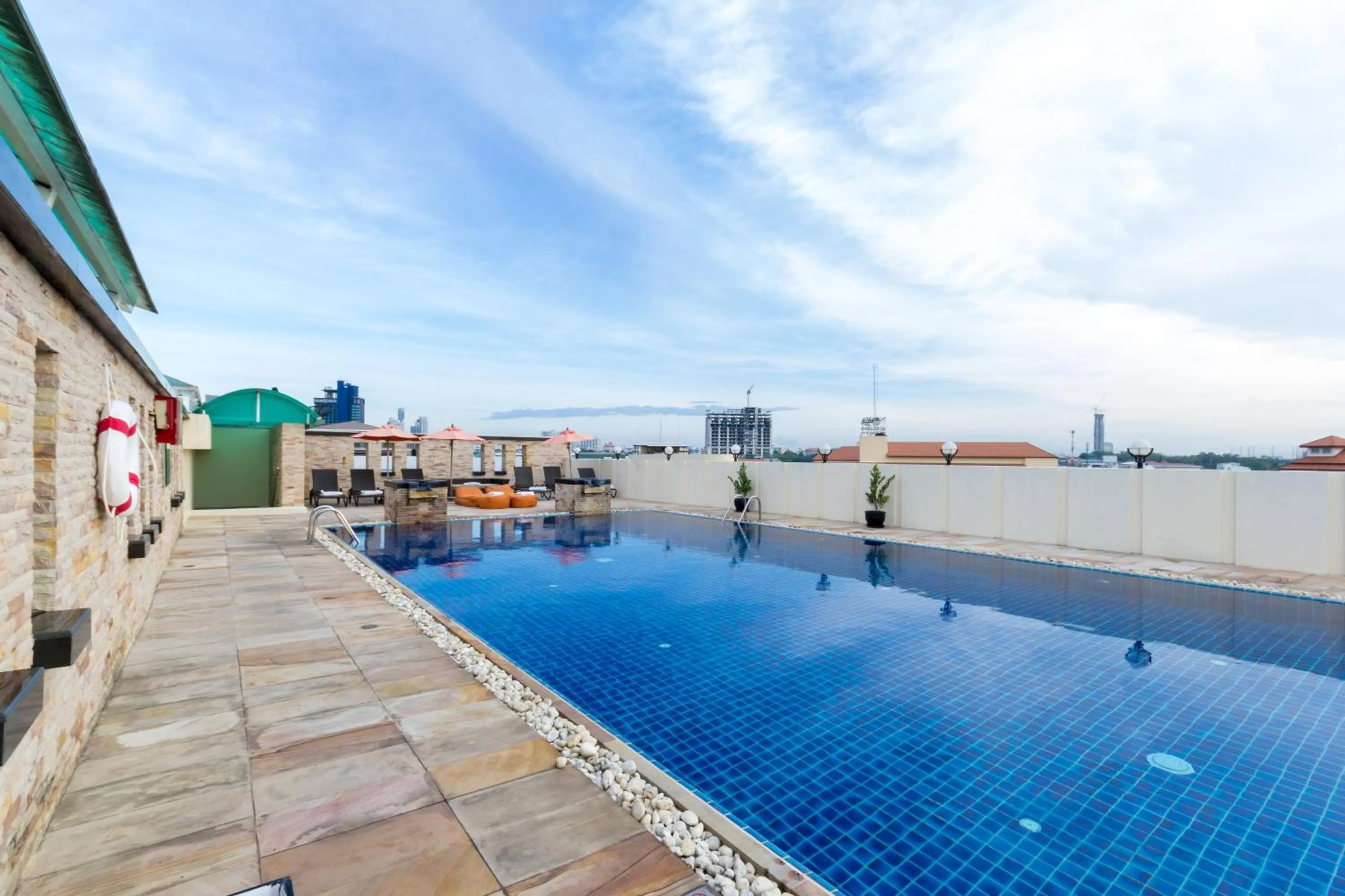 Swimming pool in Nova Suites Pattaya by Compass Hospitality