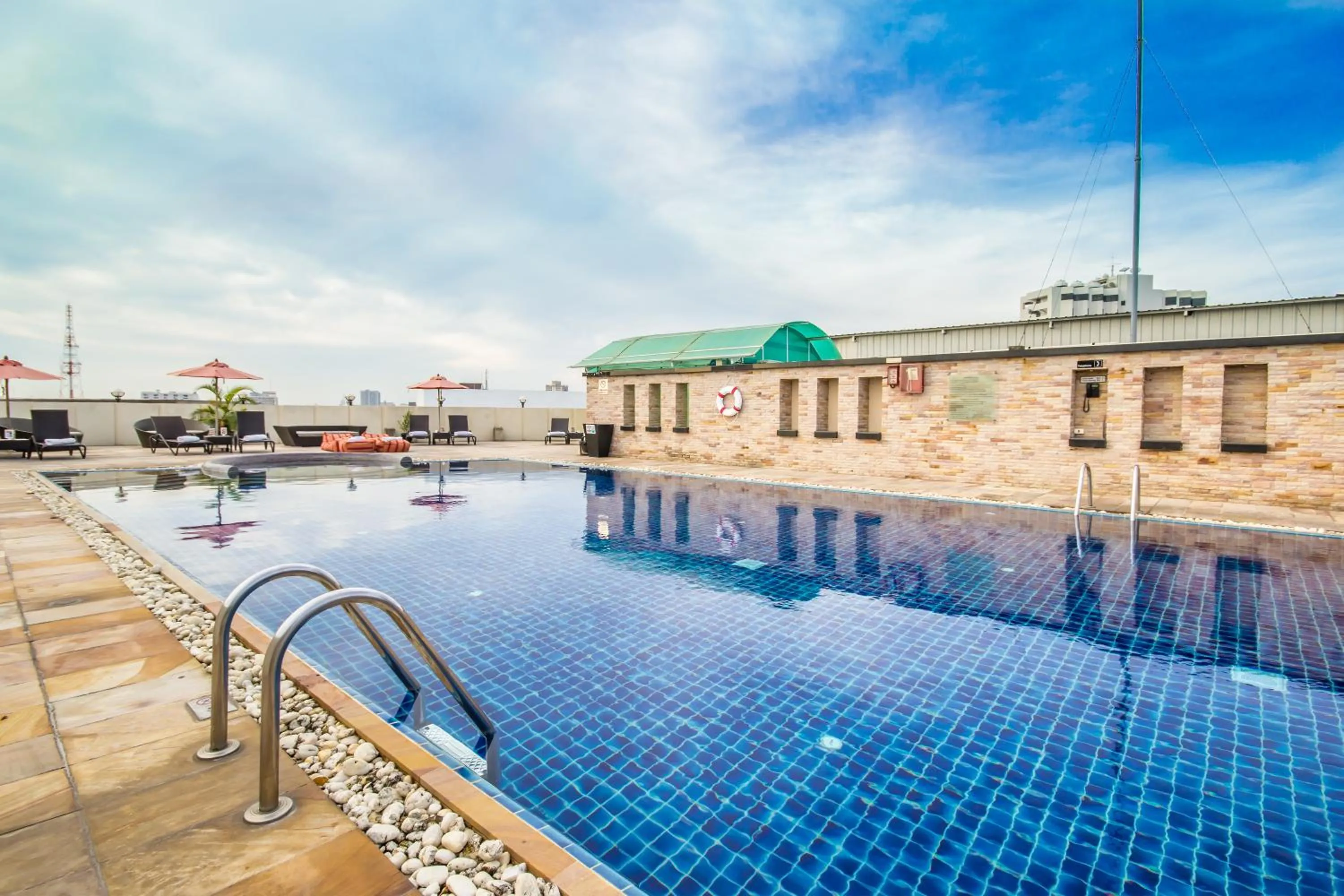 Swimming pool in Nova Suites Pattaya by Compass Hospitality