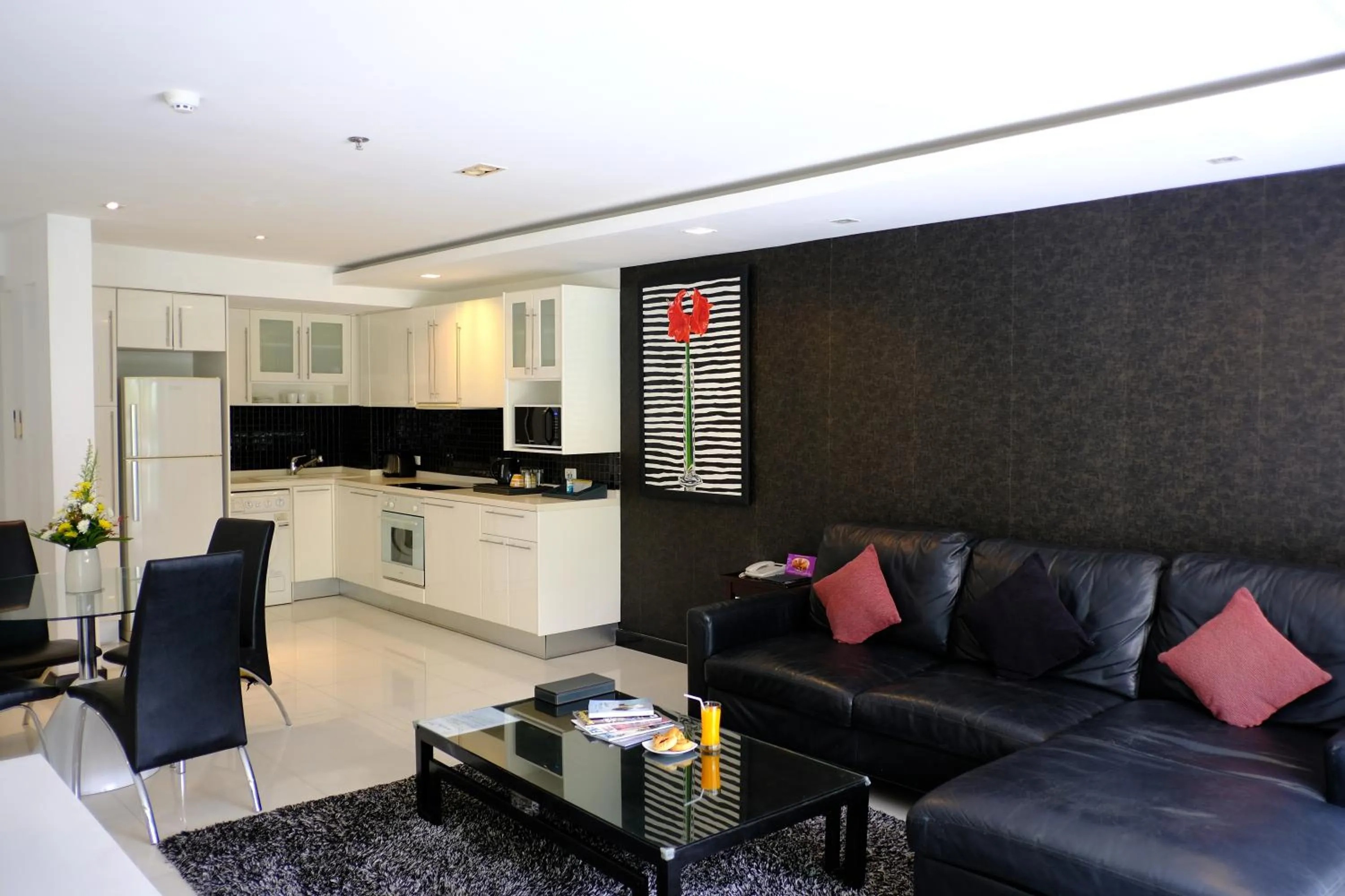 Kitchen or kitchenette in Nova Suites Pattaya by Compass Hospitality