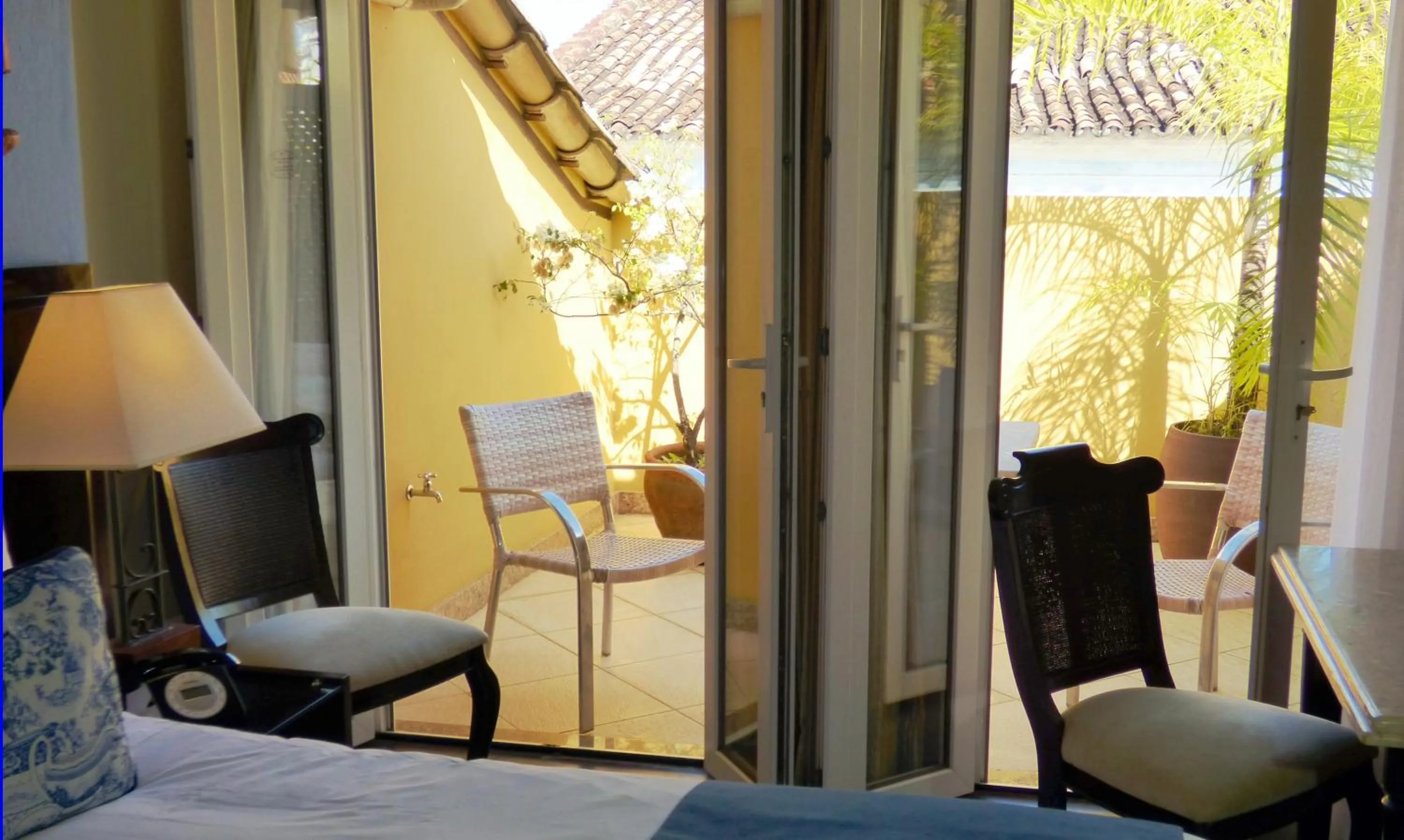 Balcony/Terrace, Bed in Hotel Casa do Amarelindo
