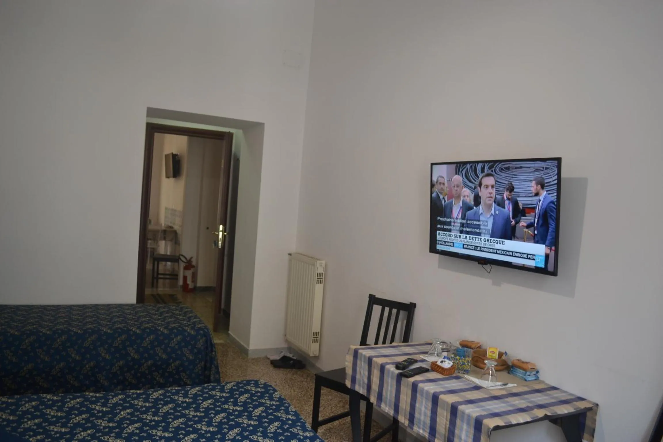 TV and multimedia, Bed in Incantoromano guest house