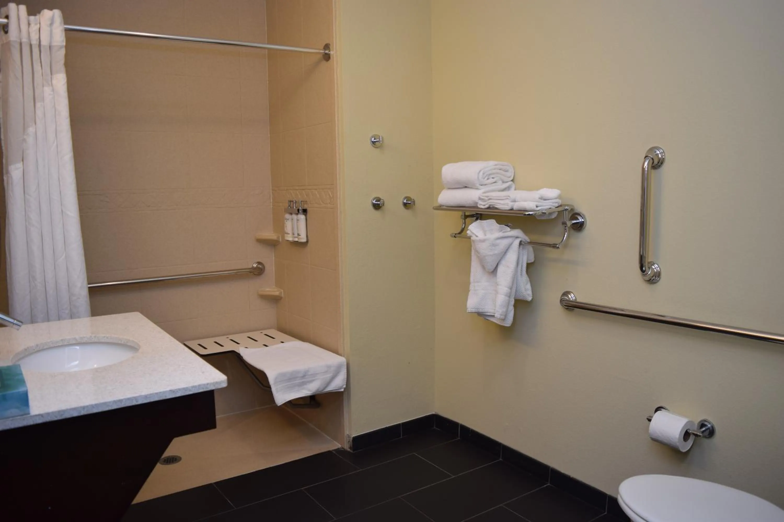 Toilet in Staybridge Suites Syracuse Liverpool by IHG
