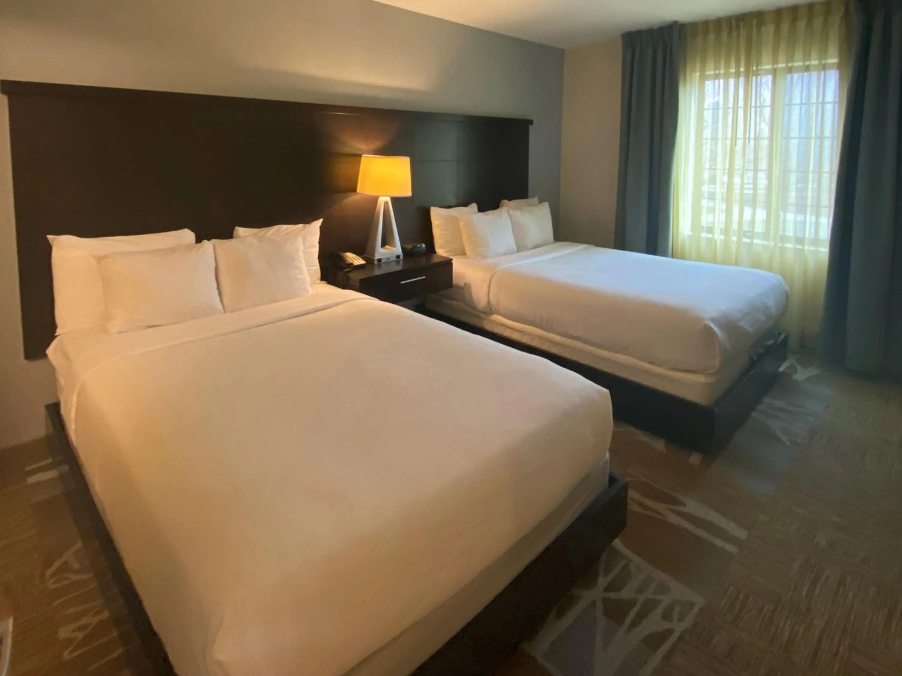 Photo of the whole room, Bed in Staybridge Suites Syracuse Liverpool by IHG