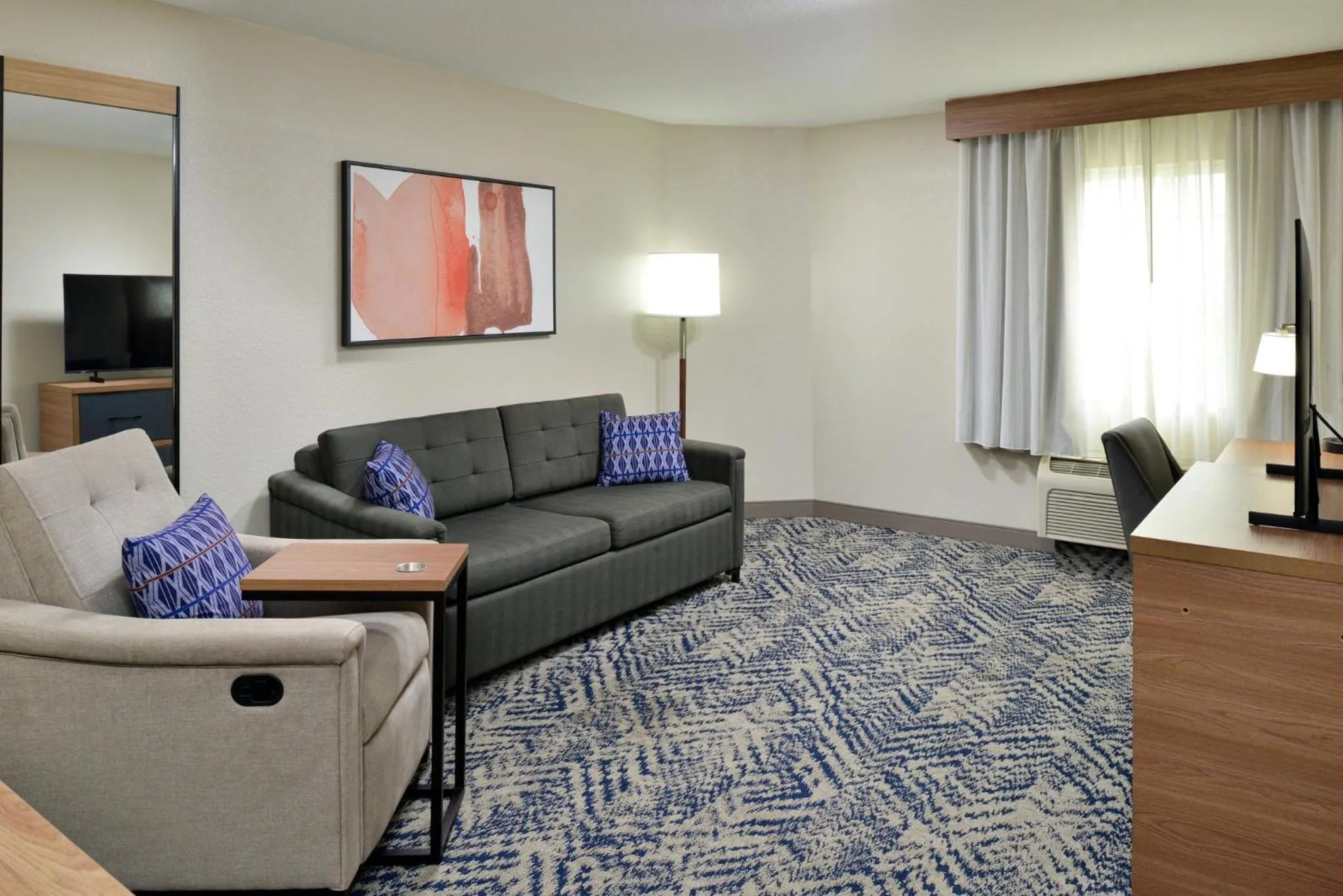 Bedroom in Candlewood Suites Kansas City Northeast by IHG