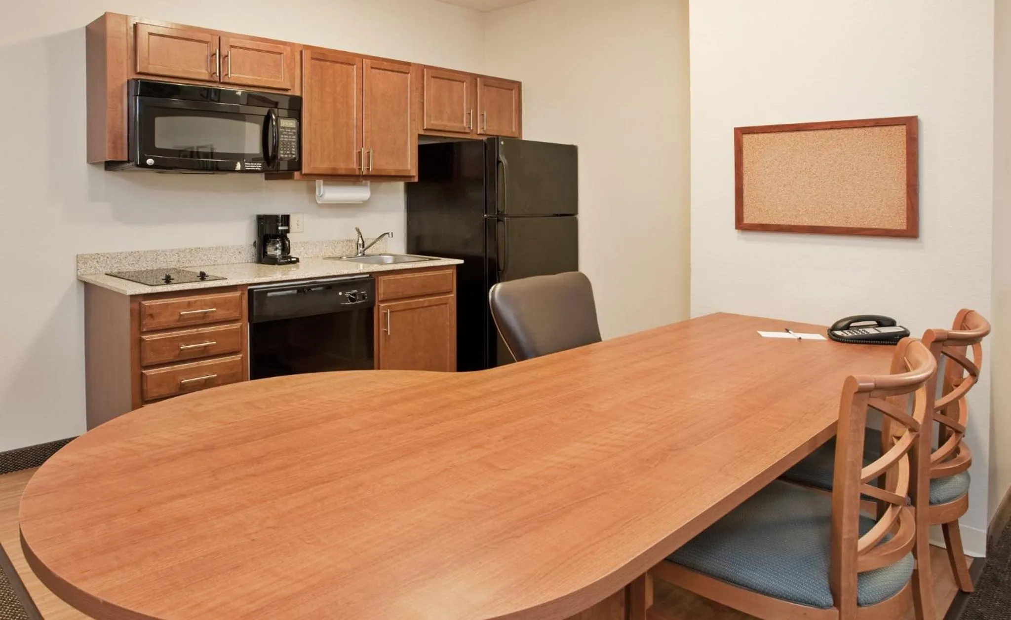 Bedroom in Candlewood Suites Kansas City Northeast by IHG