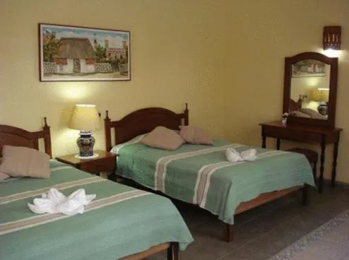 Bed in Hotel Real Del Mayab