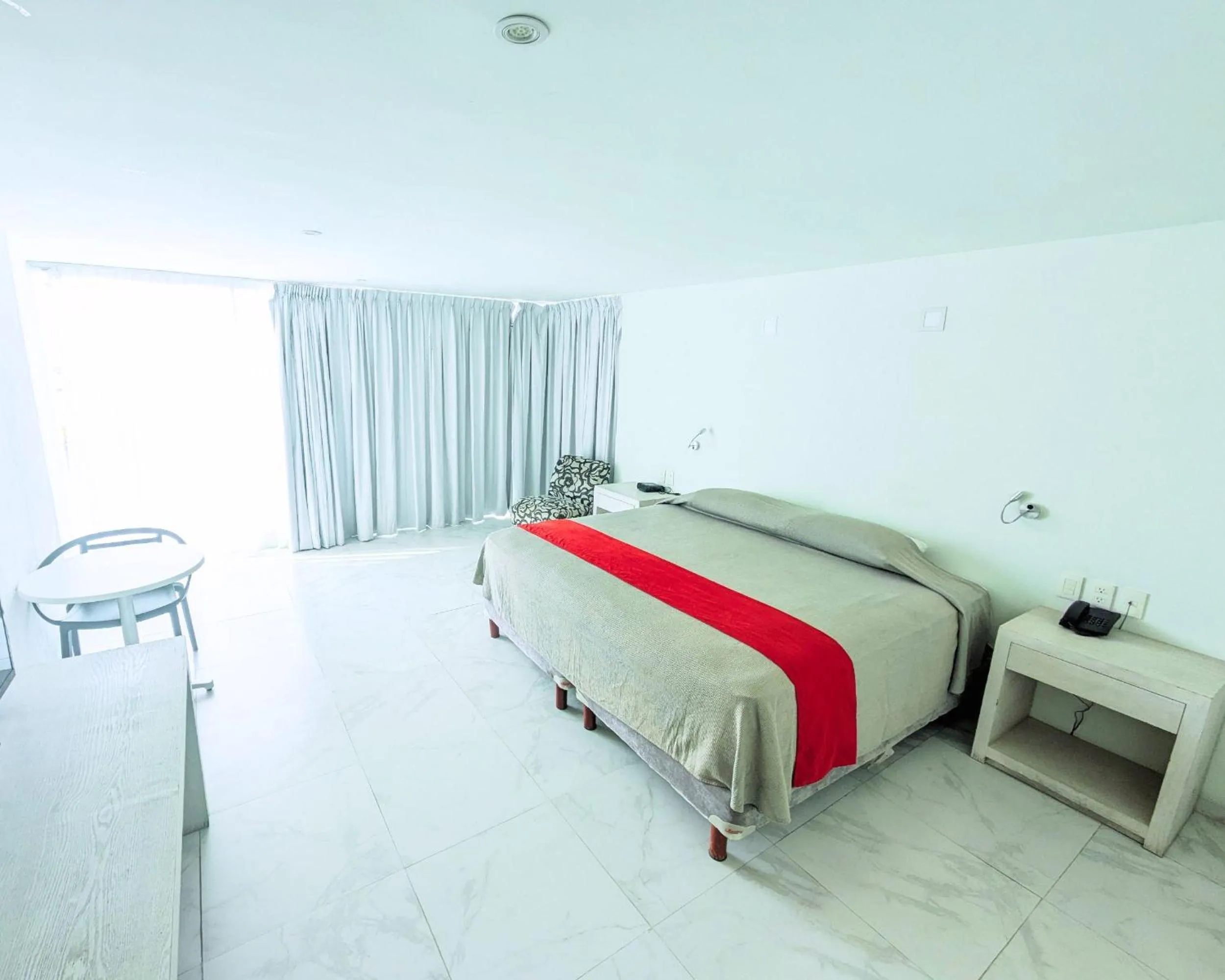 Bed in We Hotel Acapulco