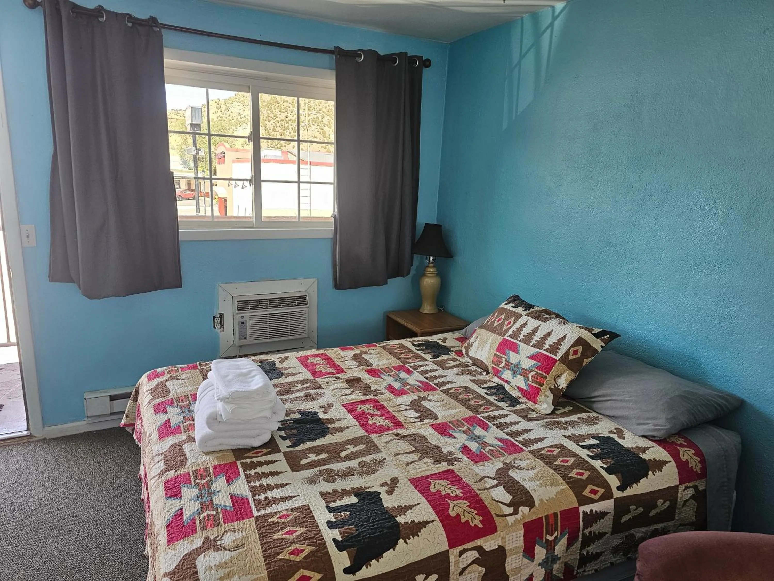 Bed in Two Rivers Inn