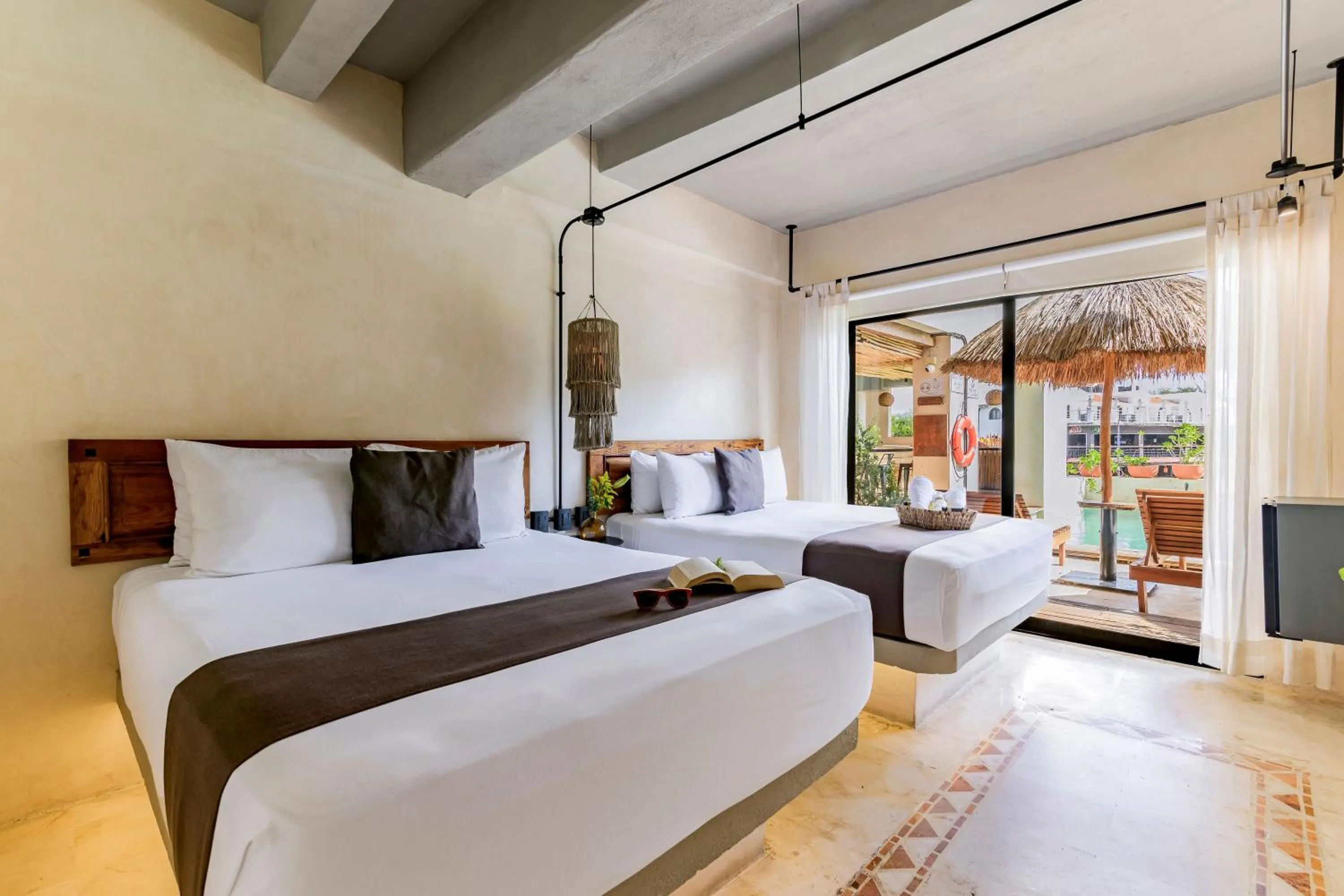 Bed in Caribbean Paradise Hotel & Spa - 5th Avenue