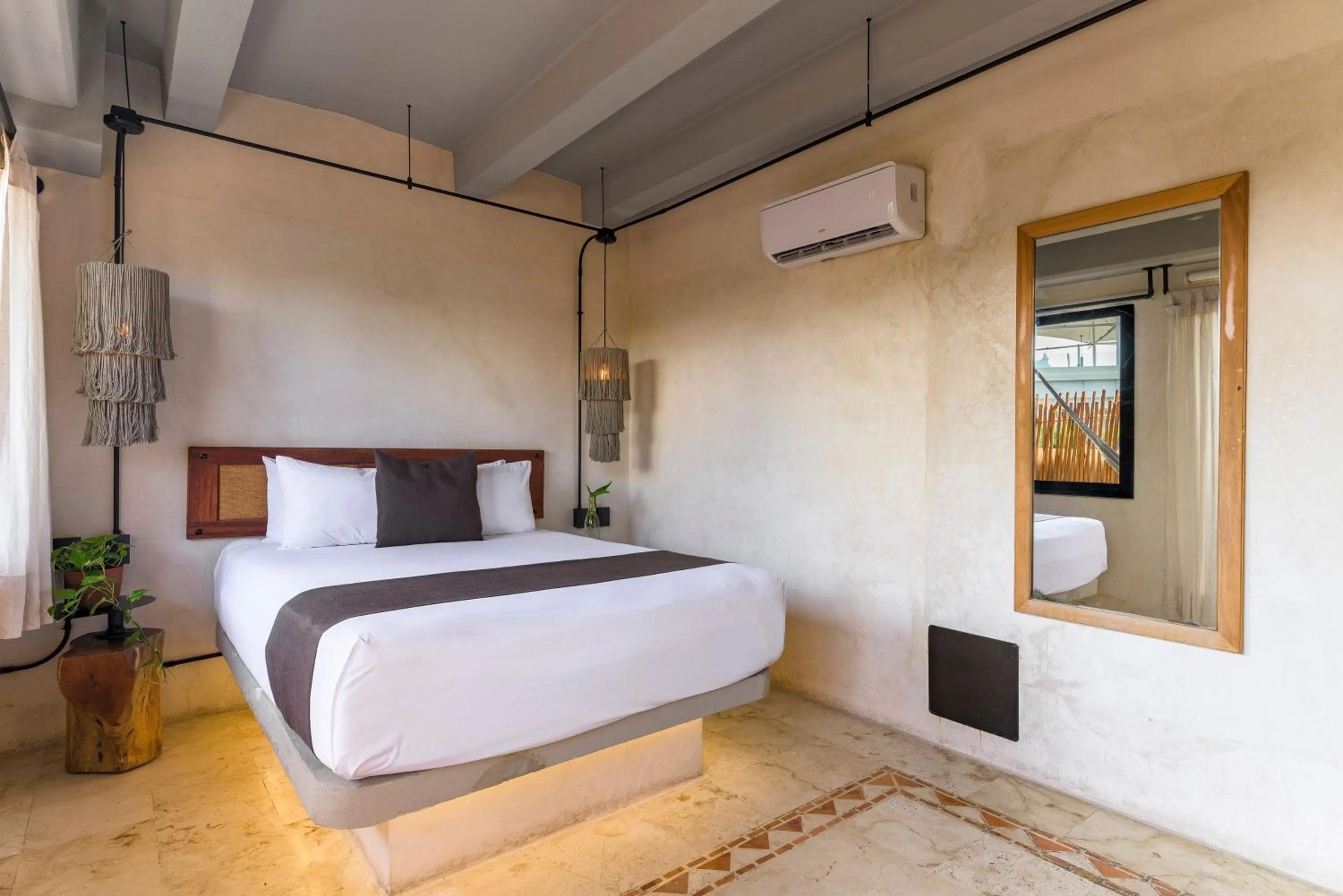 Bed in Caribbean Paradise Hotel & Spa - 5th Avenue