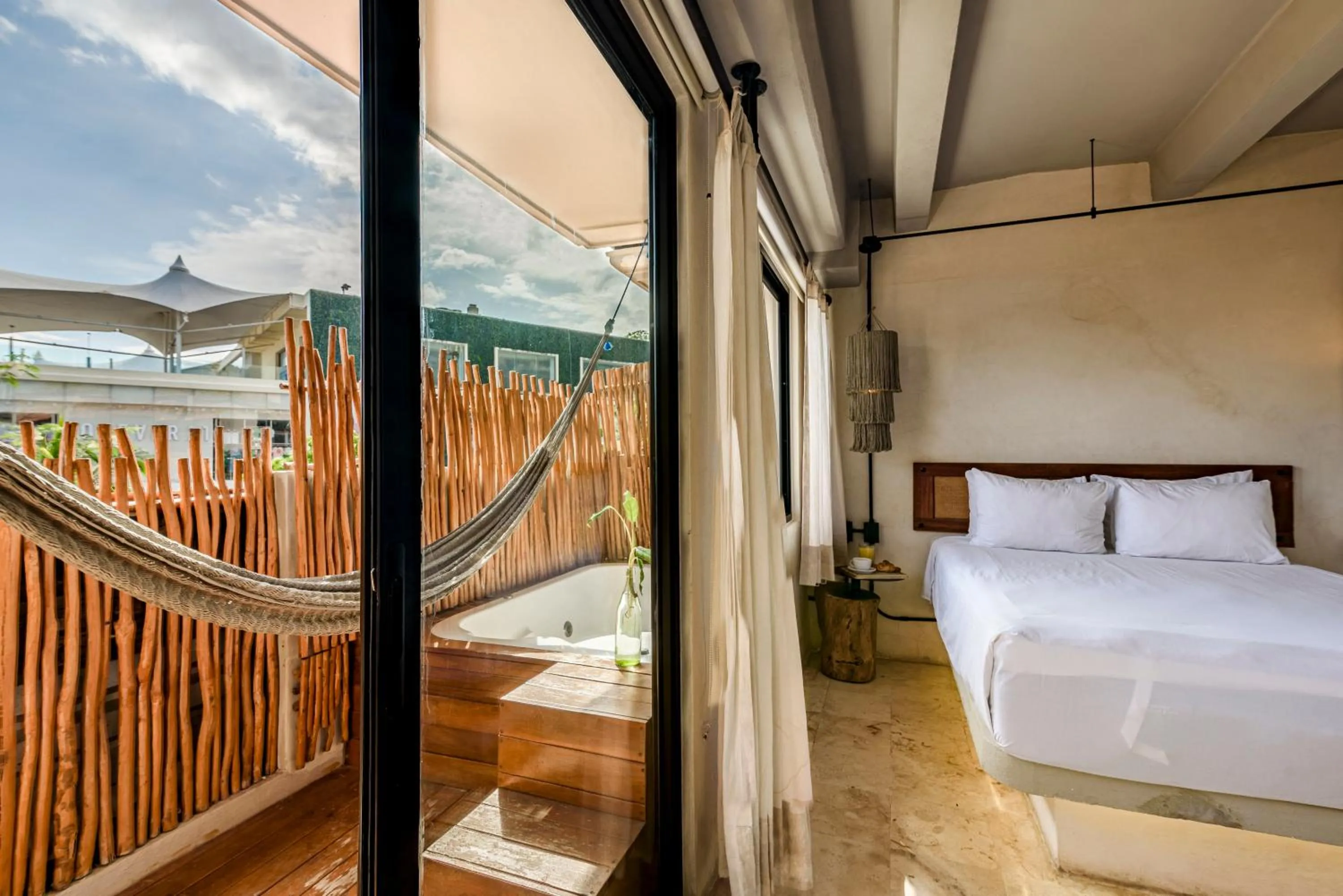 Bed in Caribbean Paradise Hotel & Spa - 5th Avenue