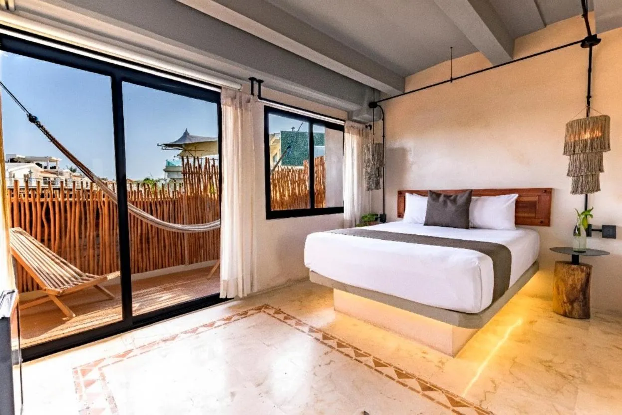 Bed in Caribbean Paradise Hotel & Spa - 5th Avenue