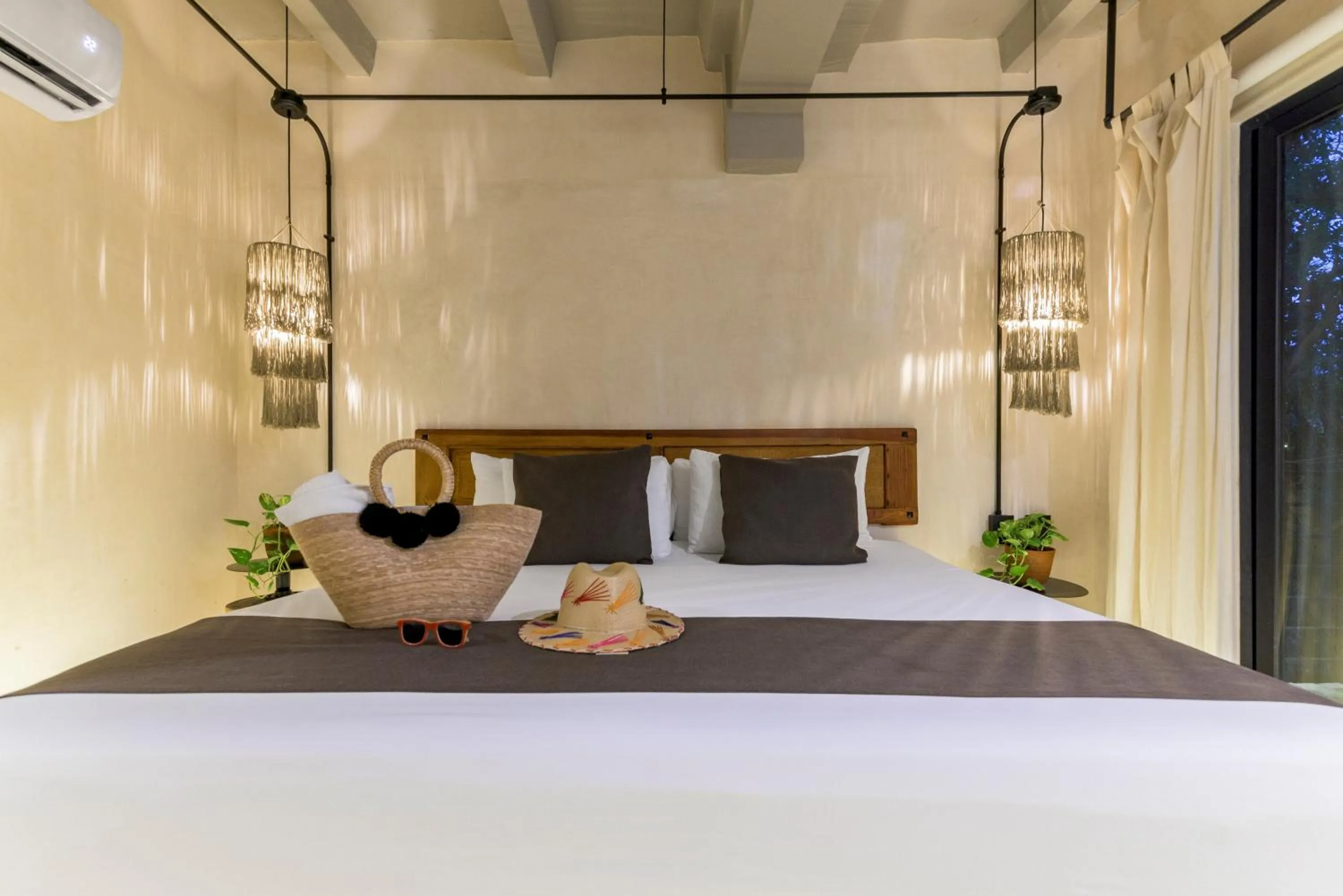 Bed in Caribbean Paradise Hotel & Spa - 5th Avenue