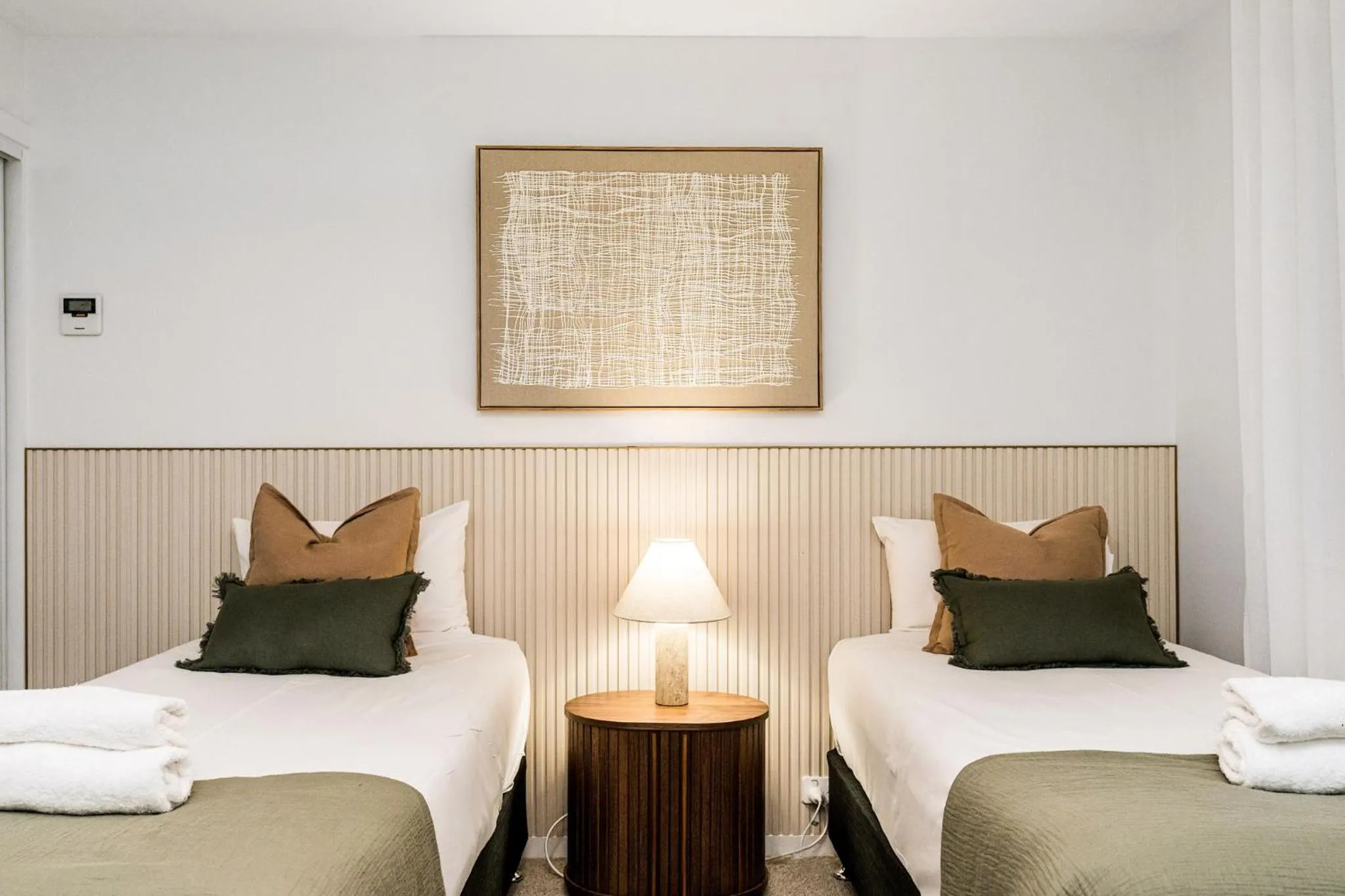 Bed in Riverside Apartments & Hotel