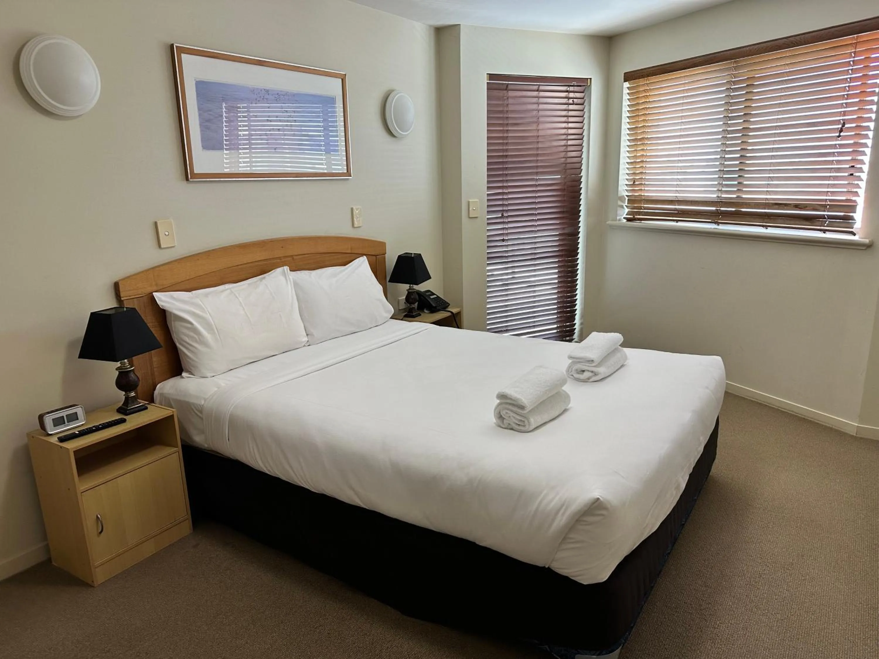 Bed in Riverside Holiday Apartments