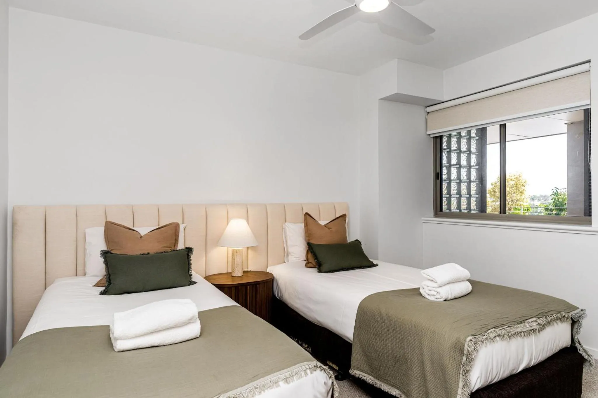 Bed in Riverside Apartments & Hotel