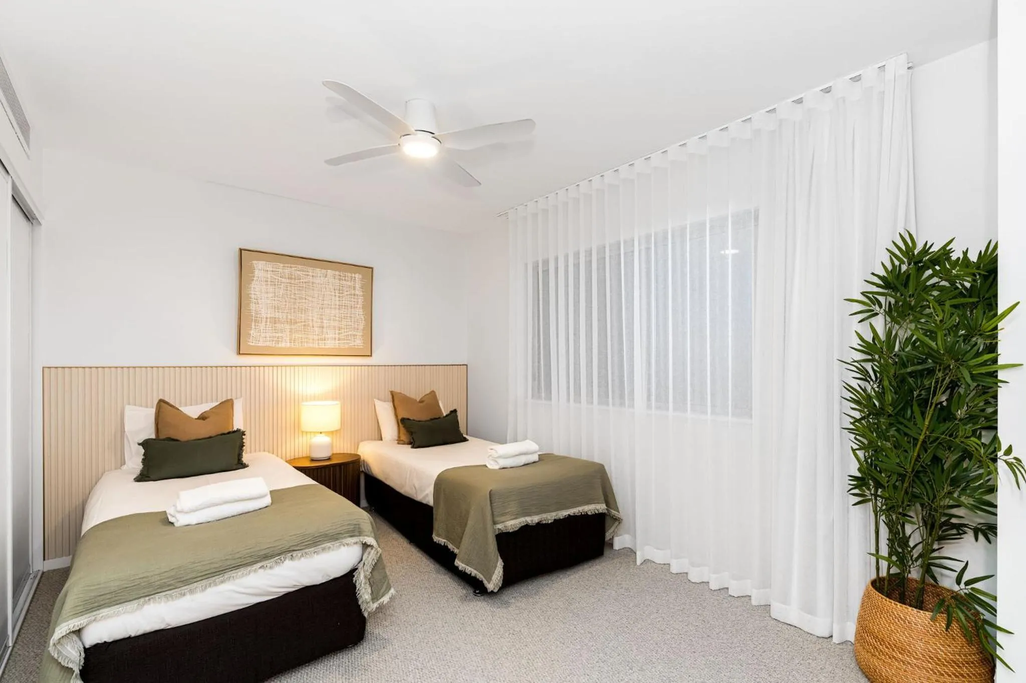 Bed in Riverside Apartments & Hotel