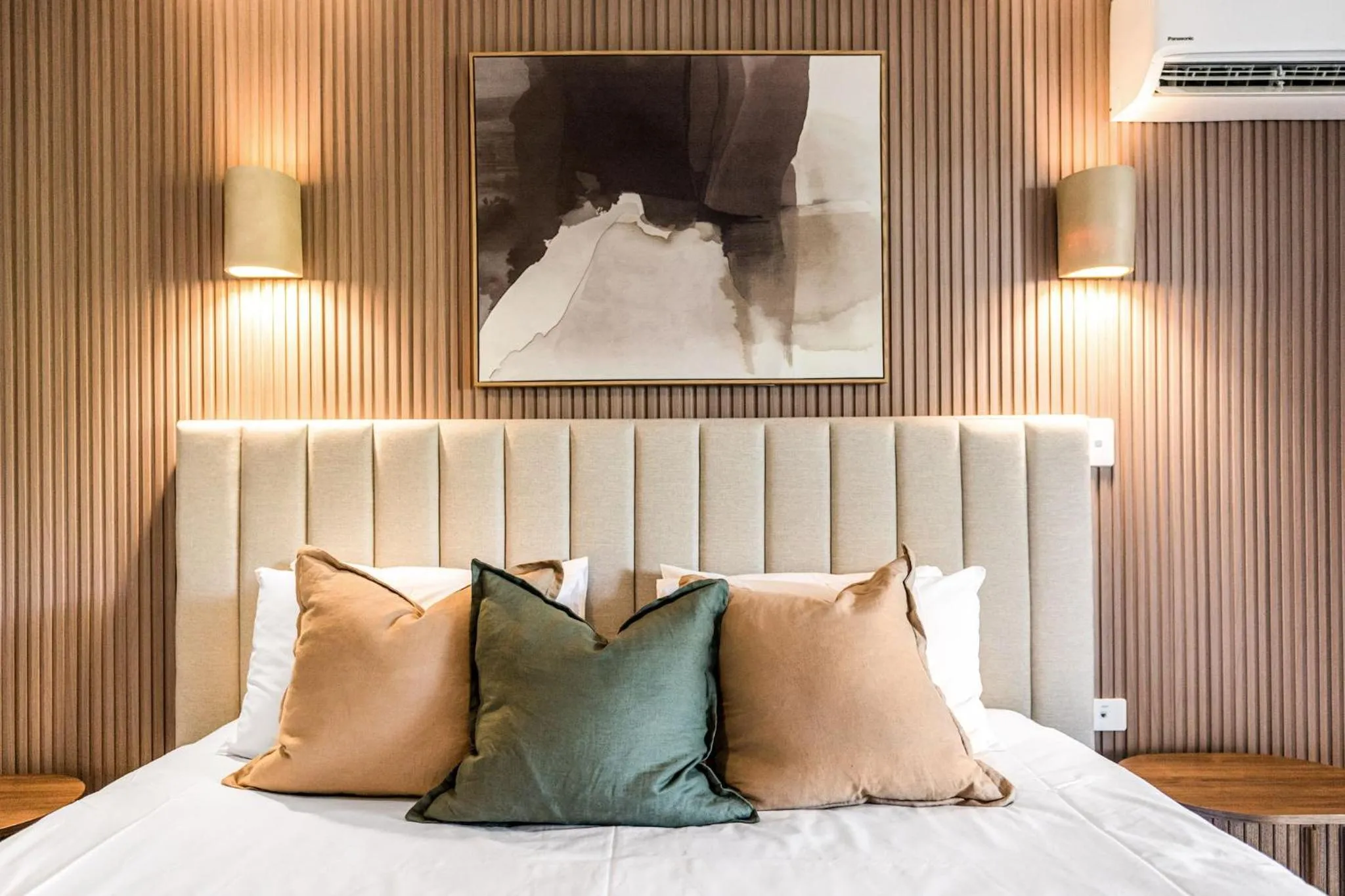 Bed in Riverside Apartments & Hotel