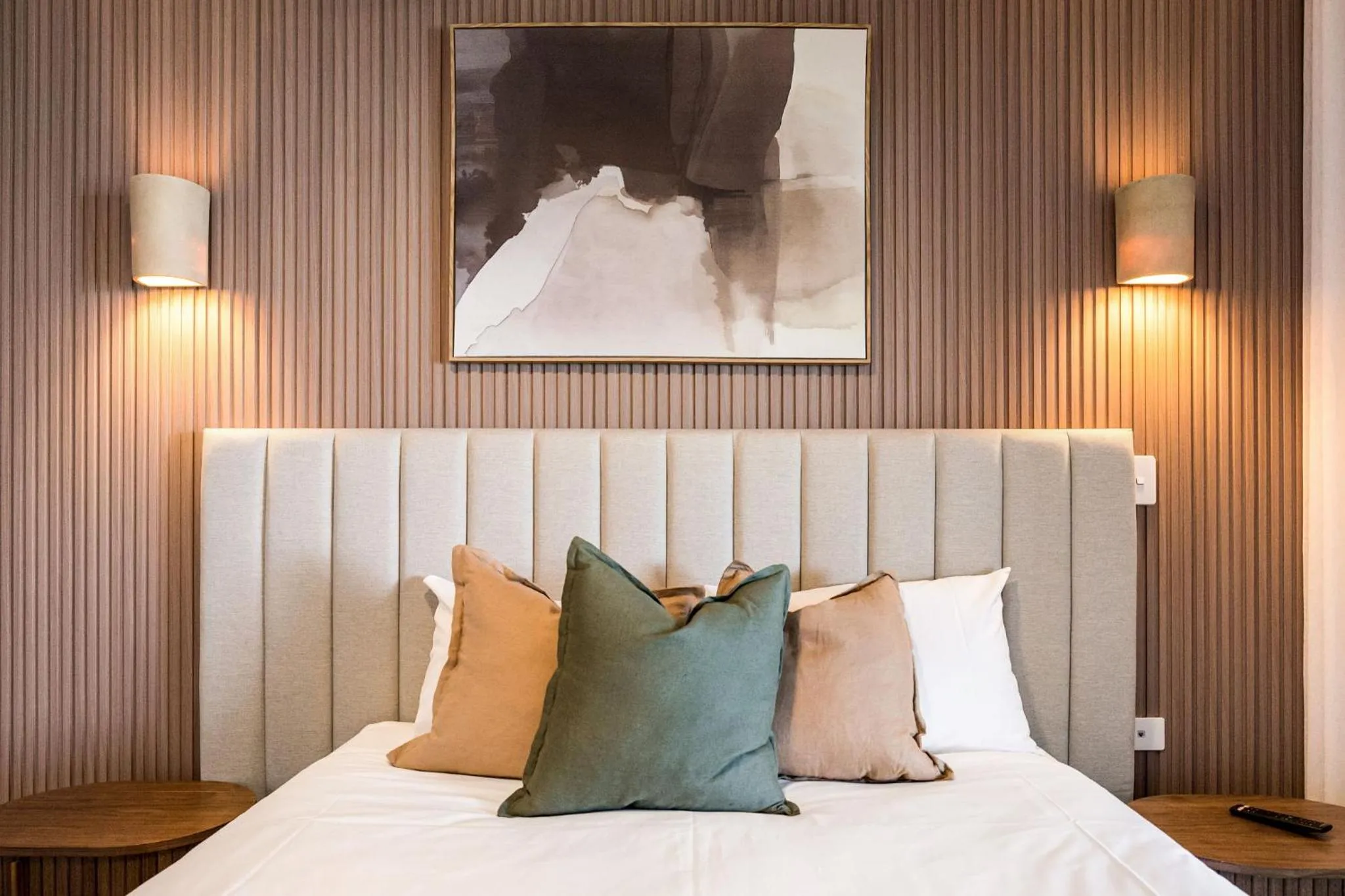 Bed in Riverside Apartments & Hotel