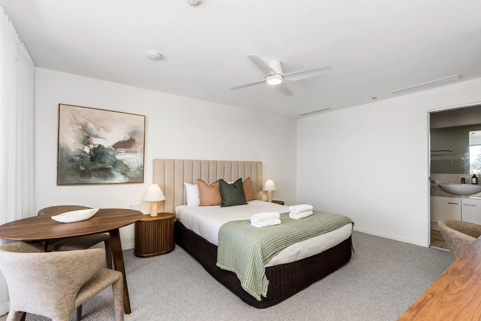 Bed in Riverside Apartments & Hotel