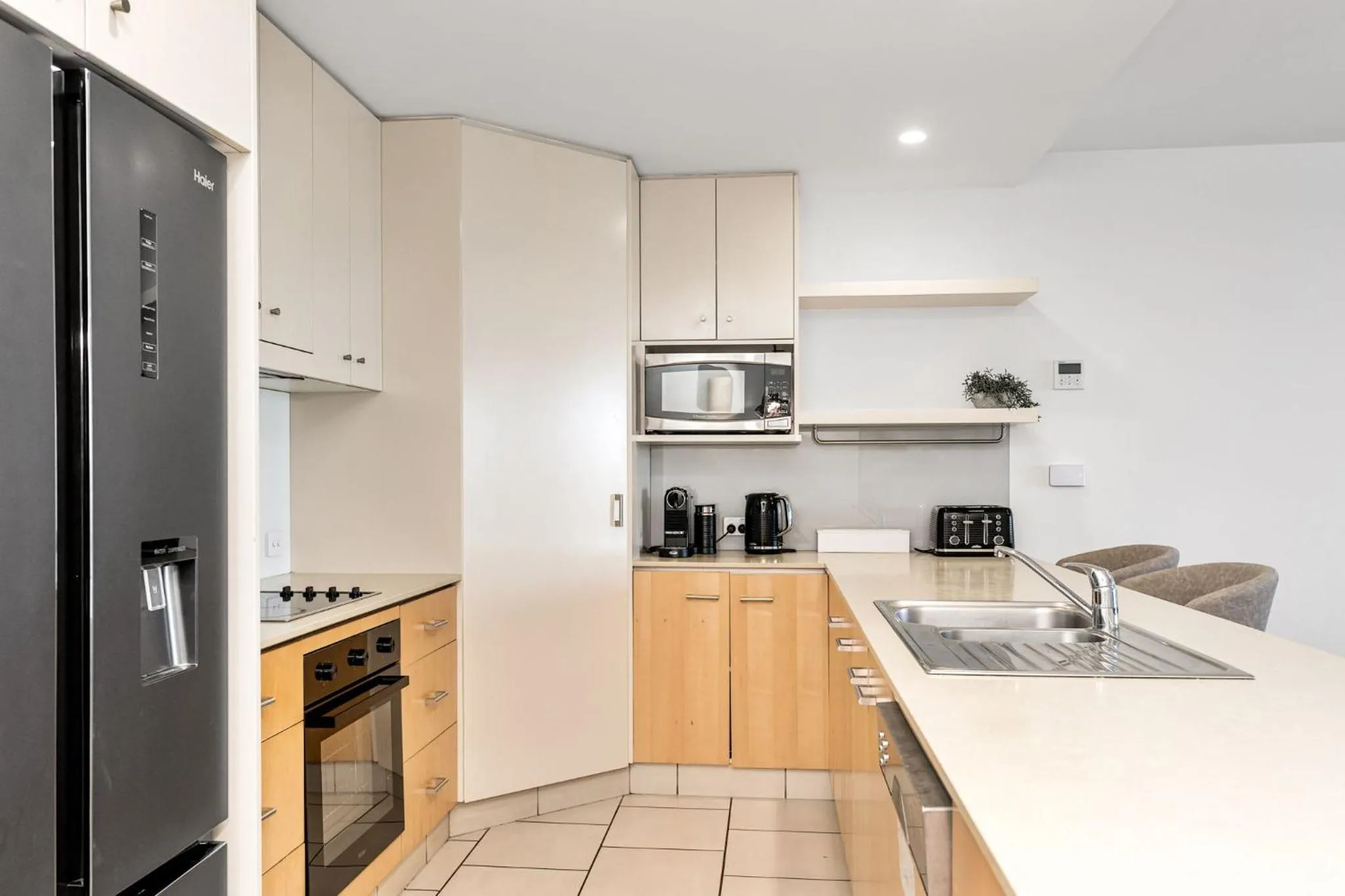 Kitchen or kitchenette in Riverside Apartments & Hotel