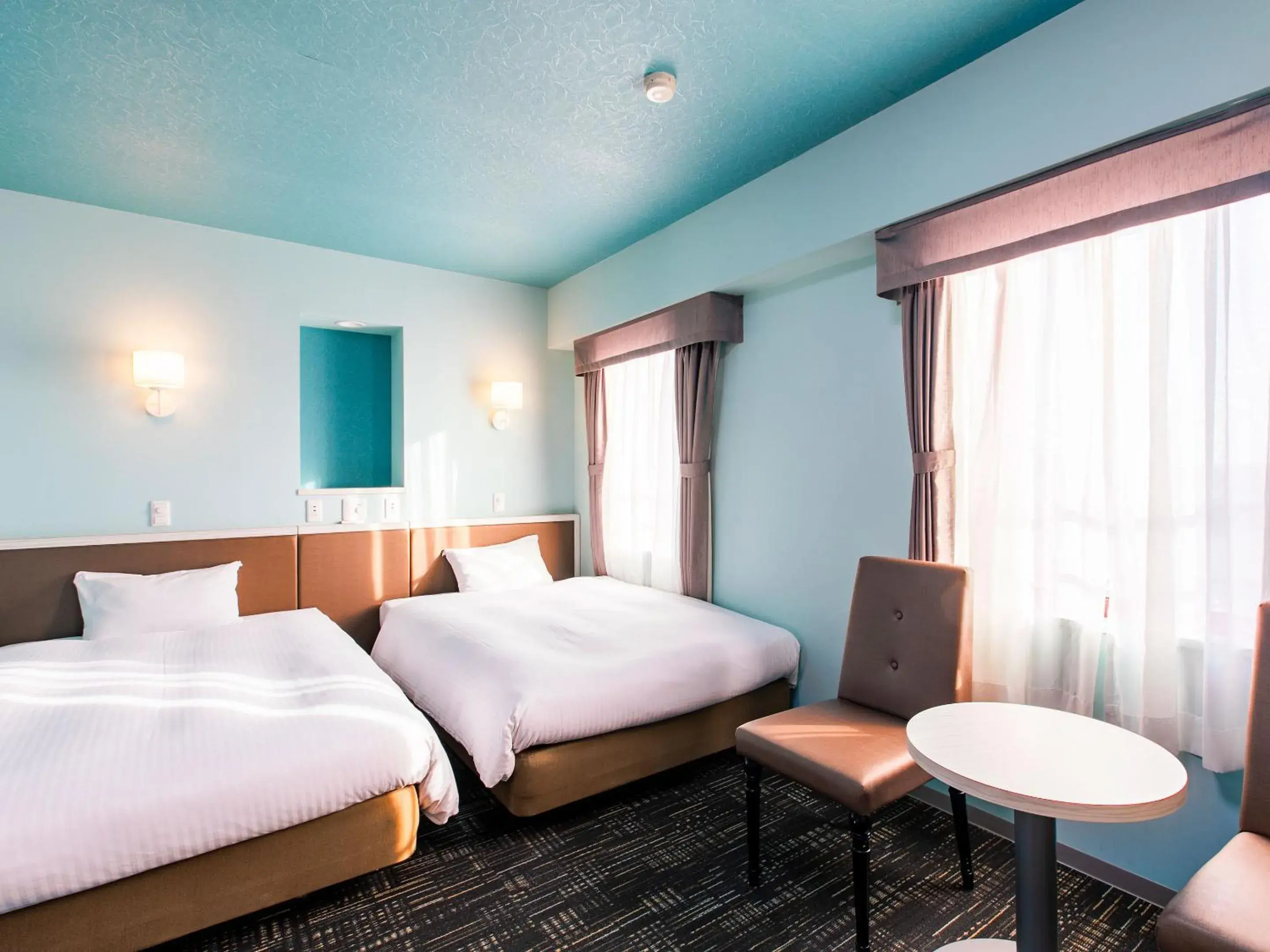 Bed in KOKO STAY Chitose - formerly Hotel Wing International Chitose Bed in KOKO STAY Chitose - formerly Hotel Wing International Chitose