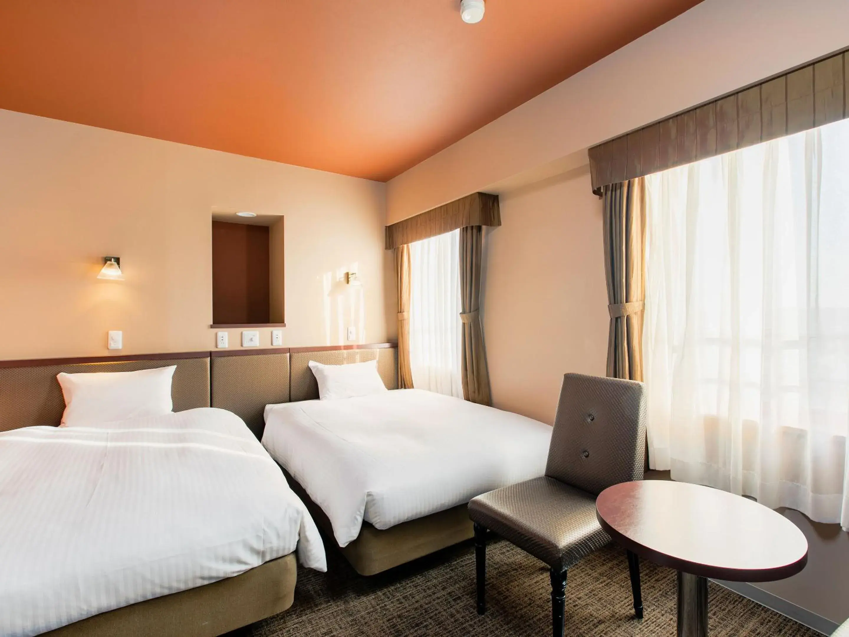 Bed in KOKO STAY Chitose - formerly Hotel Wing International Chitose Bed in KOKO STAY Chitose - formerly Hotel Wing International Chitose