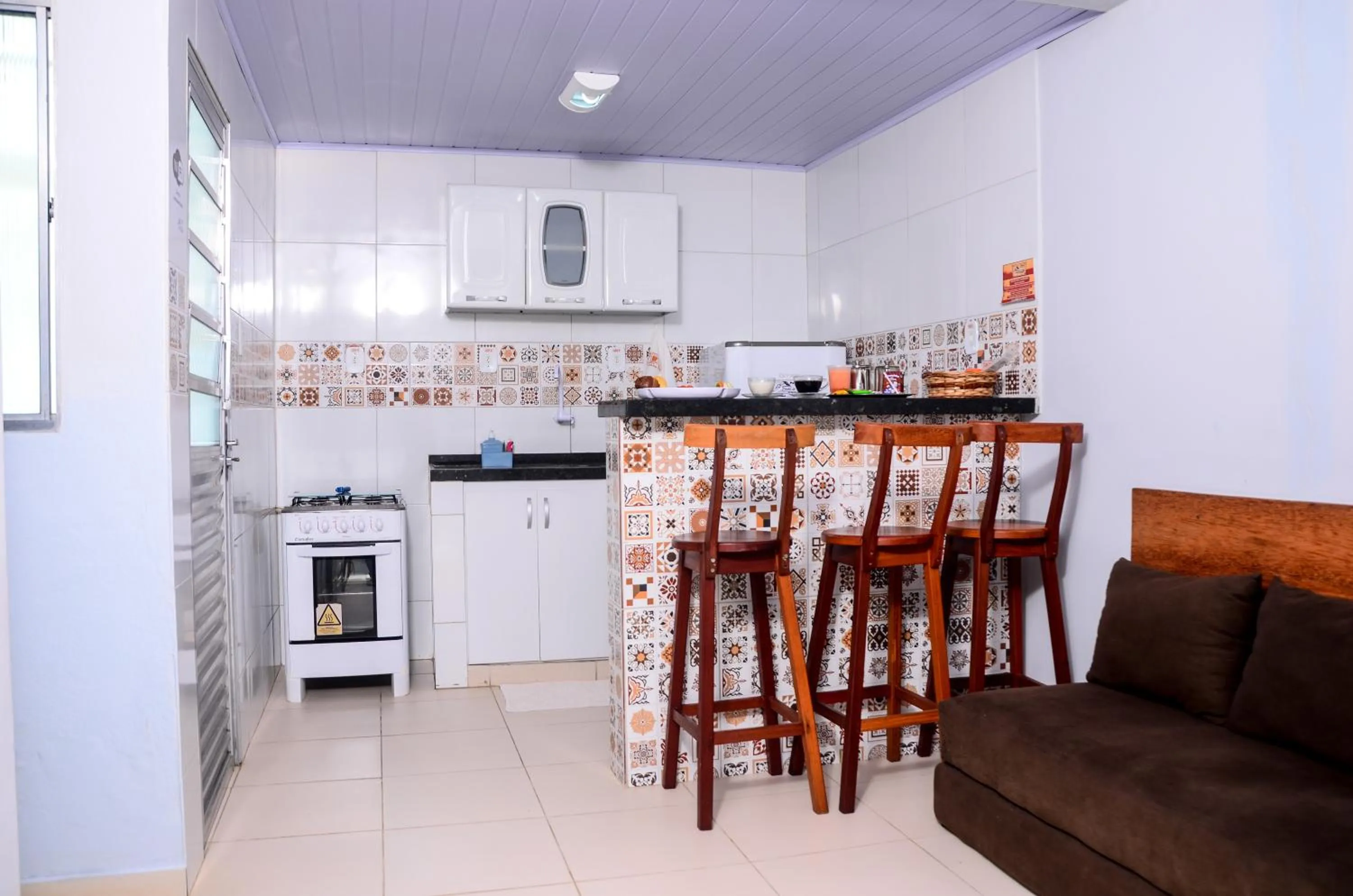 Kitchen or kitchenette in Pousada Chalés do Toque