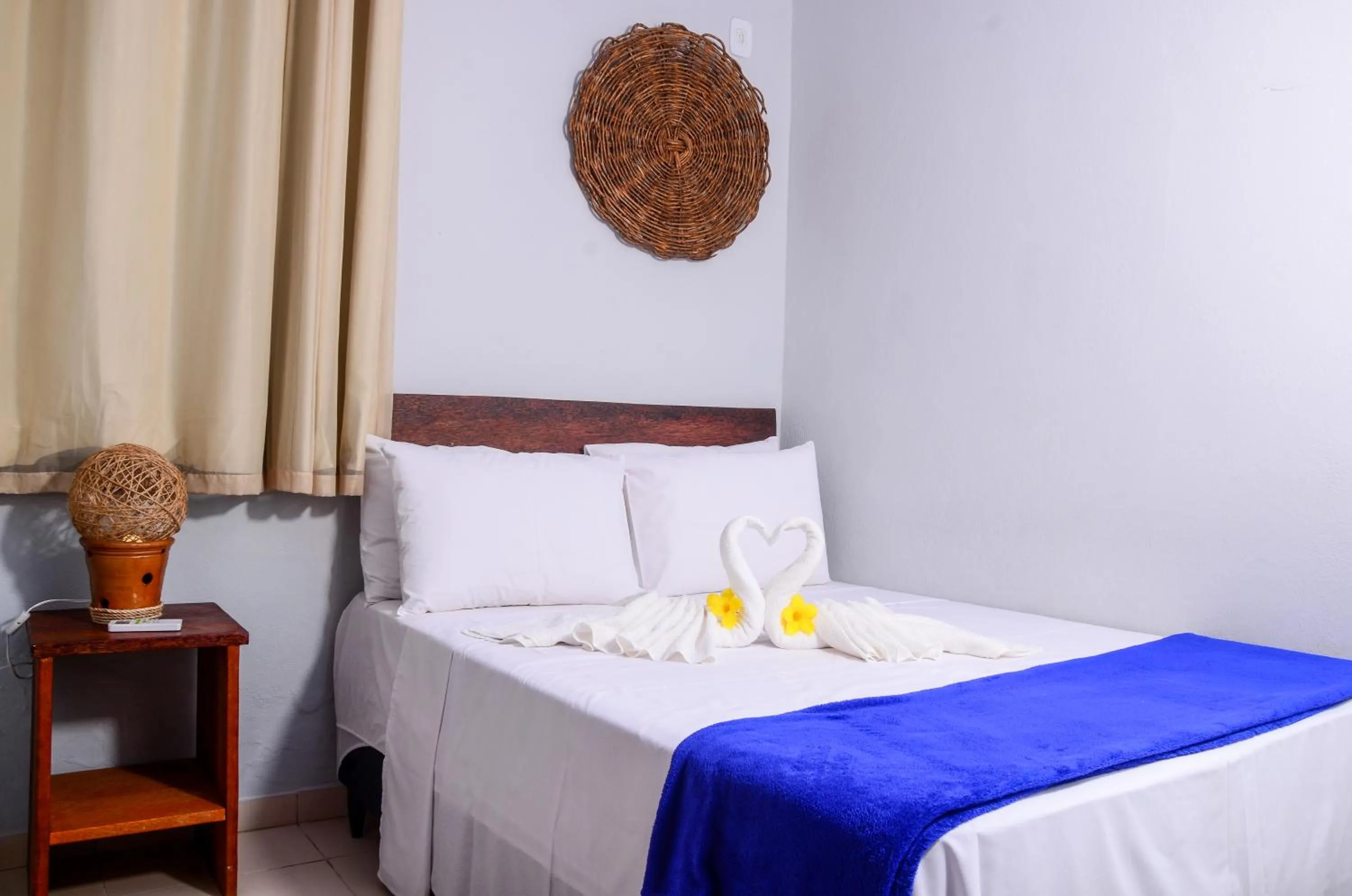 Bed in Pousada Chalés do Toque