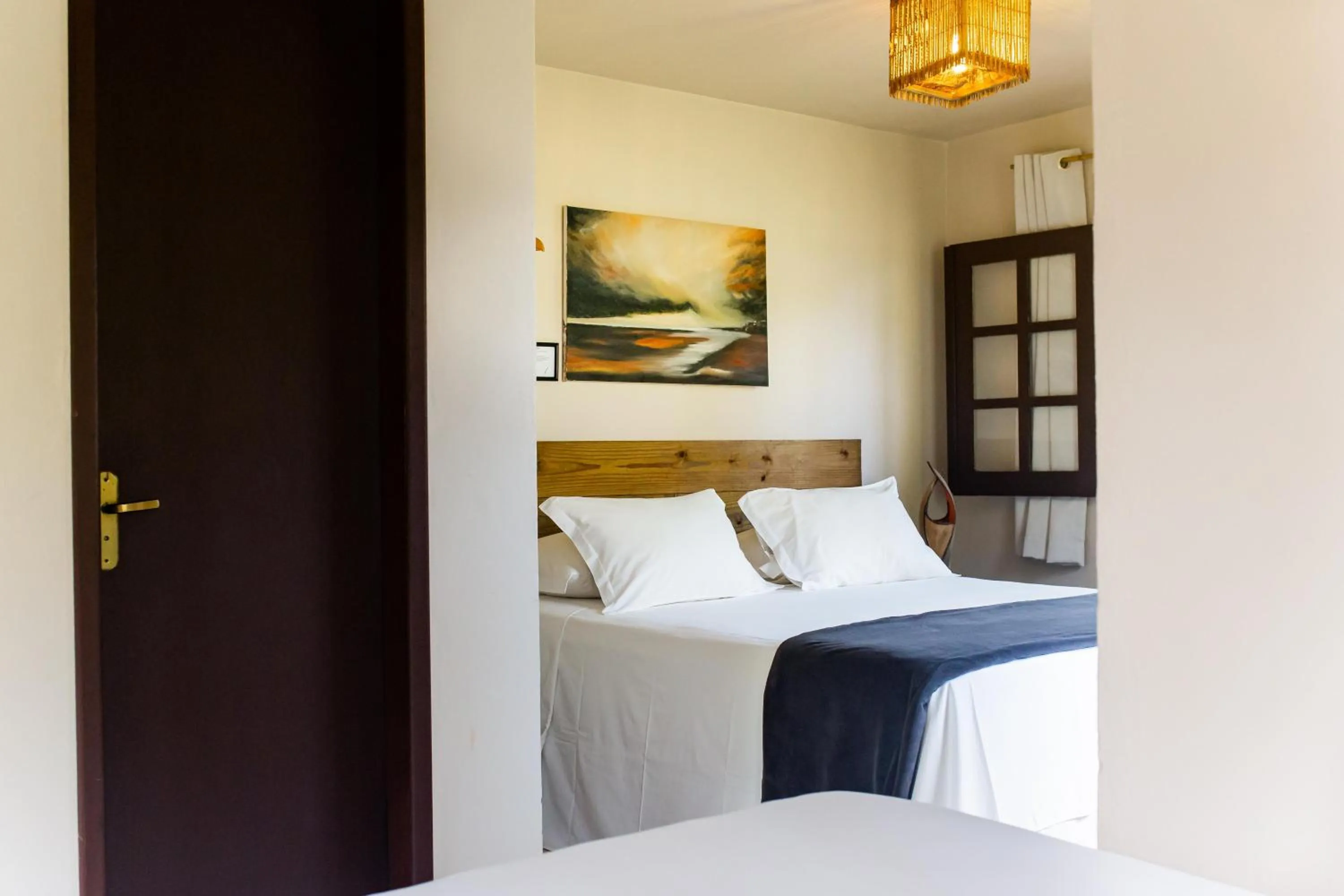 Bed in Rumah Pousada